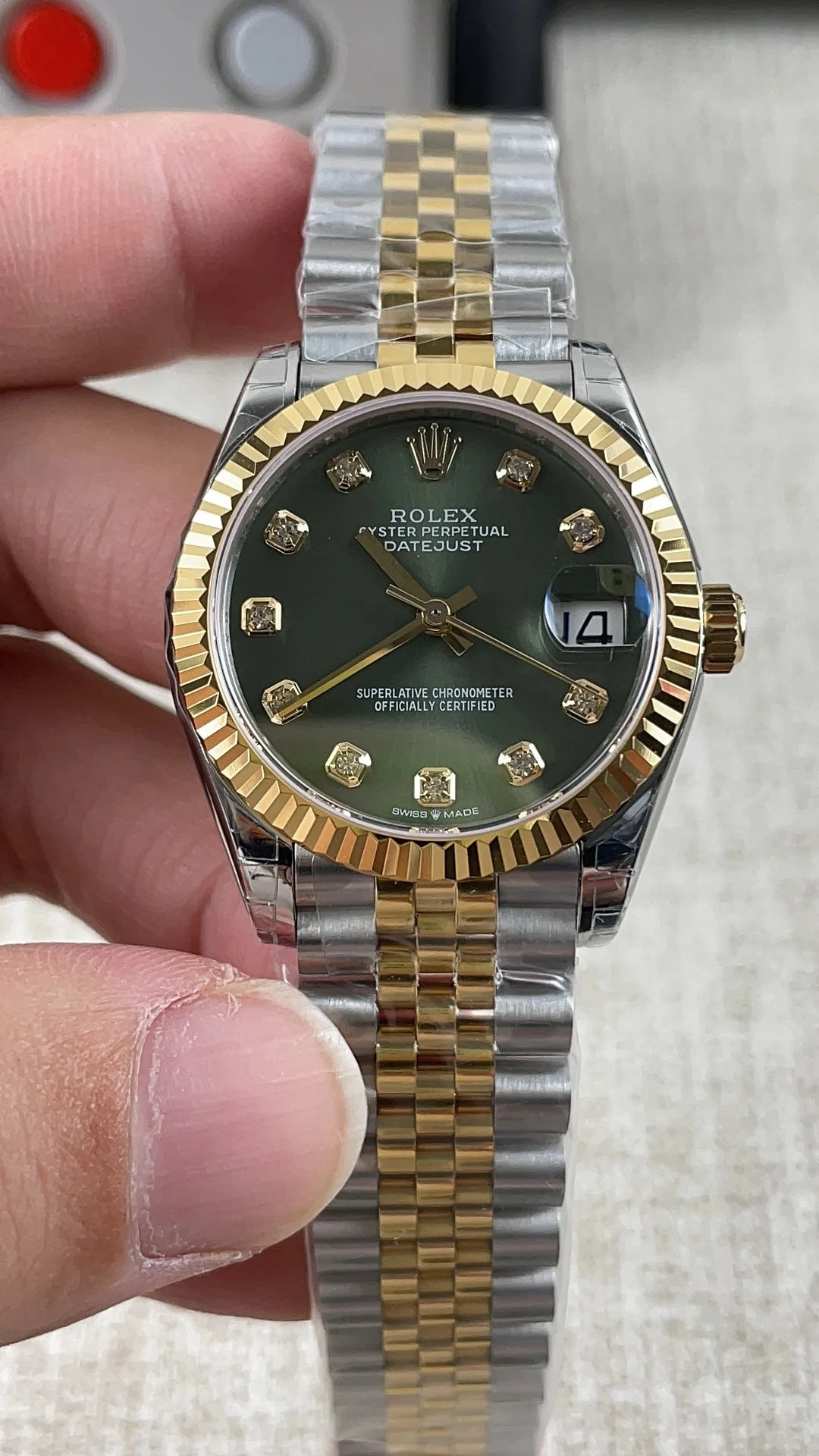 Rolex Datejust Two-Tone Green Dial Diamond-Set 31mm — photographed off the sweep