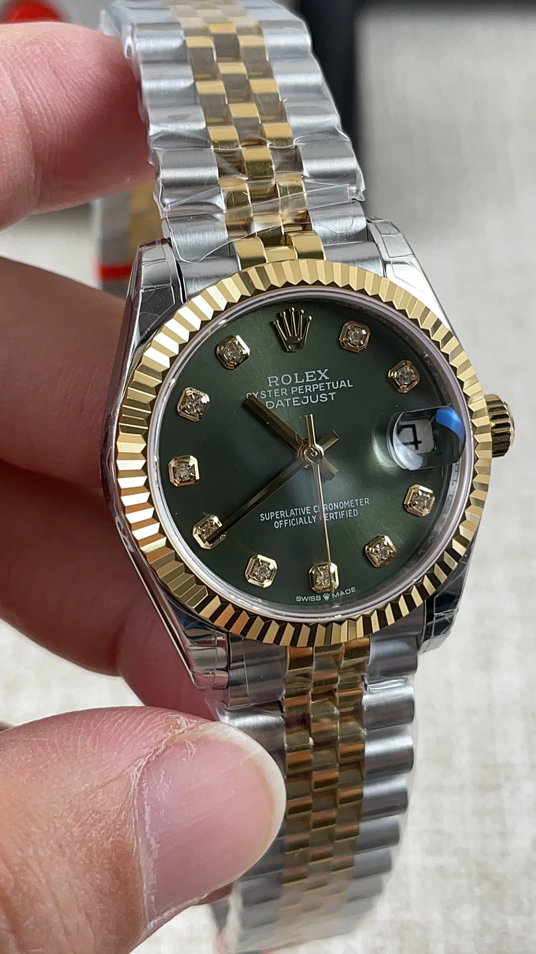 Rolex Datejust Two-Tone Green Dial Diamond-Set 31mm — photographed off the sweep