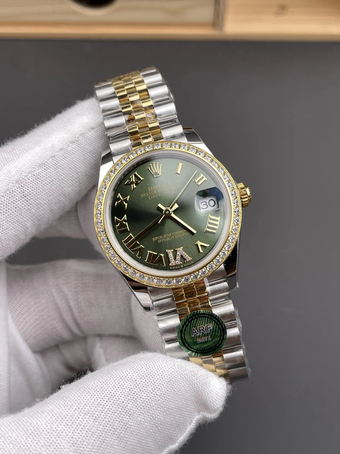 Rolex Datejust Two-Tone Green Dial Diamond-Set 31mm — photographed off the sweep