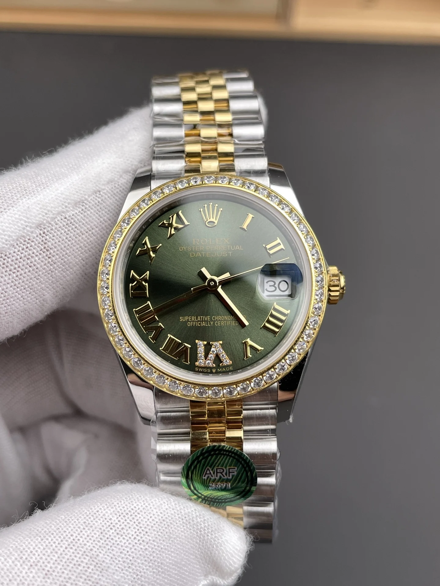 Rolex Datejust Two-Tone Green Dial Diamond-Set 31mm — photographed off the sweep