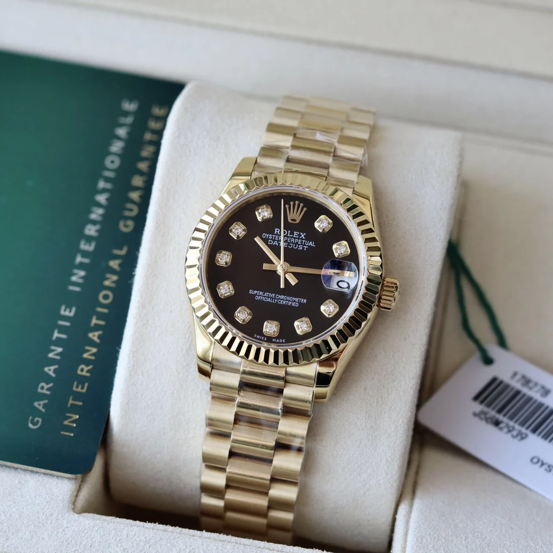 Rolex Datejust Yellow Gold White Dial Diamond-Set 31mm — photographed off the sweep