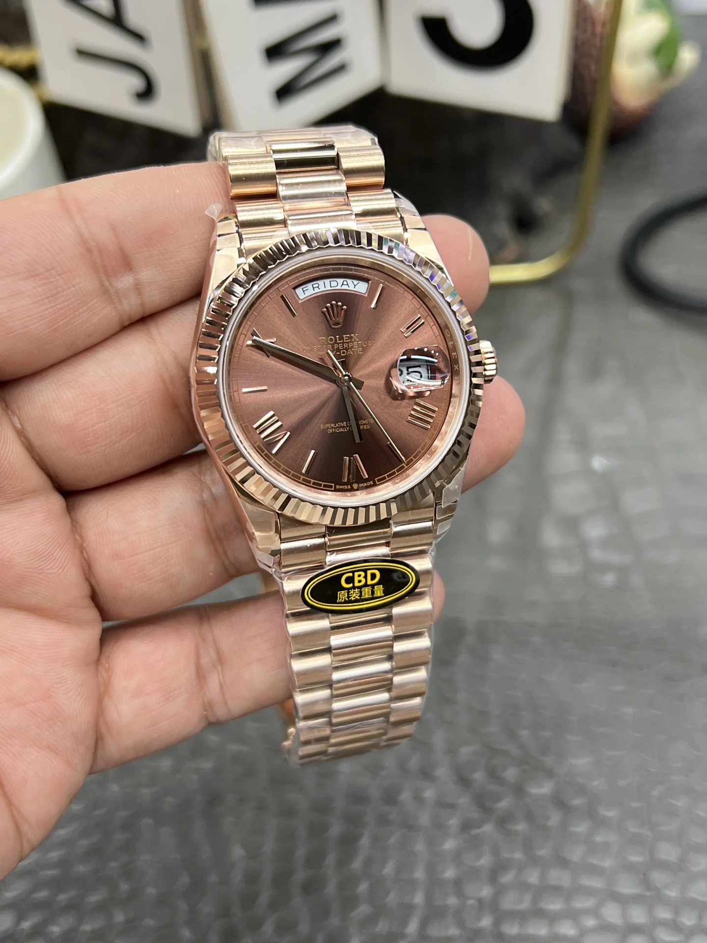 Rolex Day-Date — photographed off the sweep