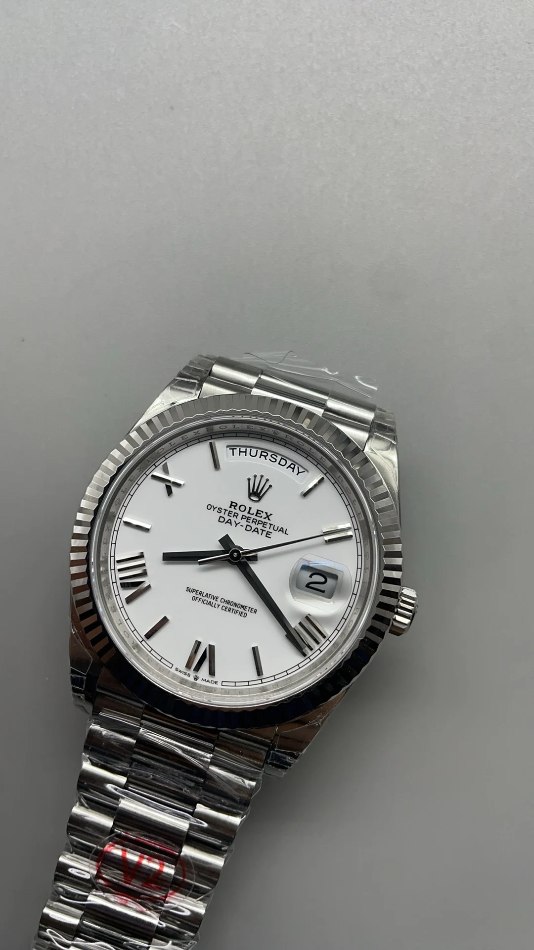 Rolex Day-Date Ceramic White Dial 40mm — photographed off the sweep