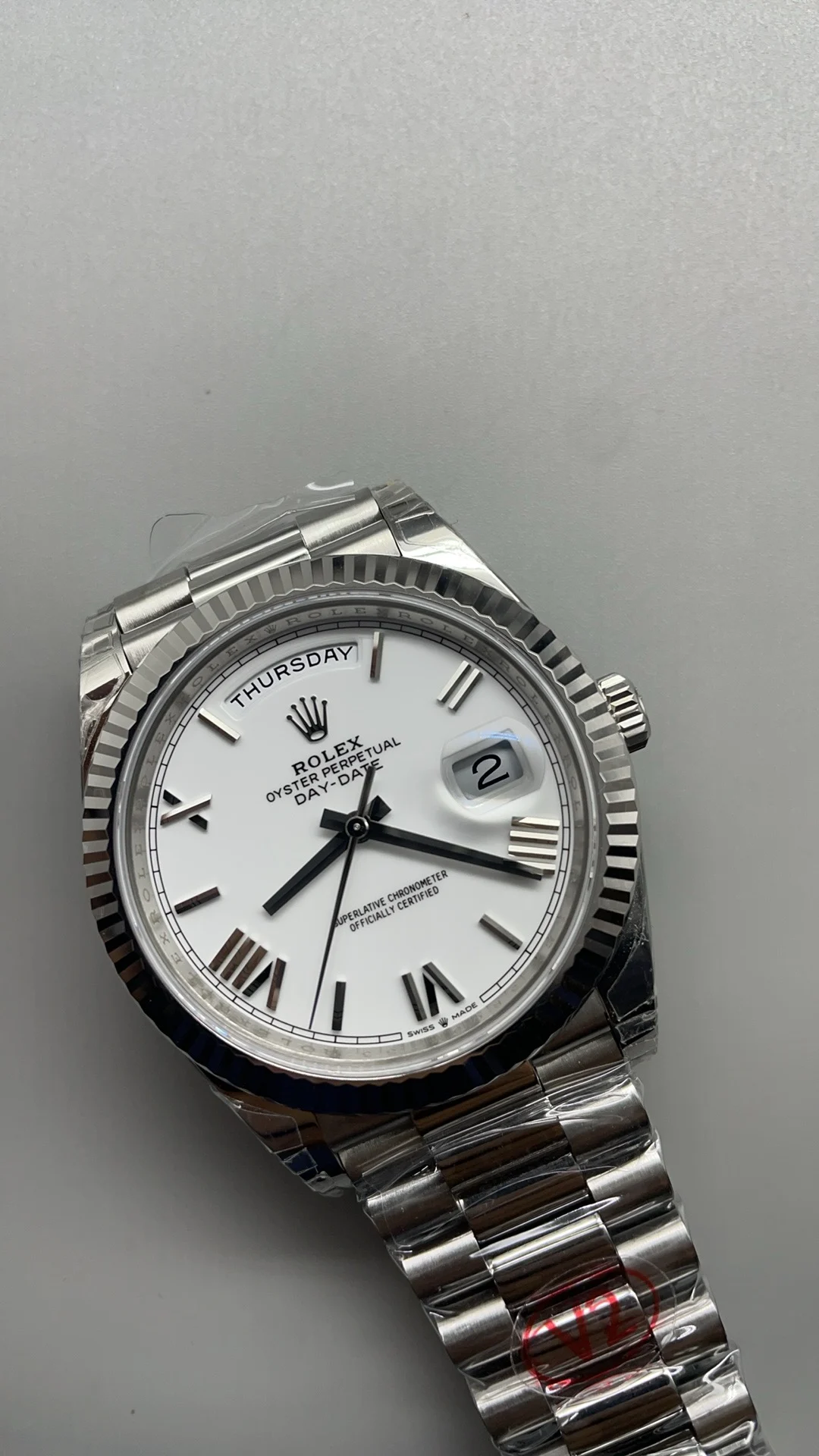 Rolex Day-Date Ceramic White Dial 40mm — photographed off the sweep