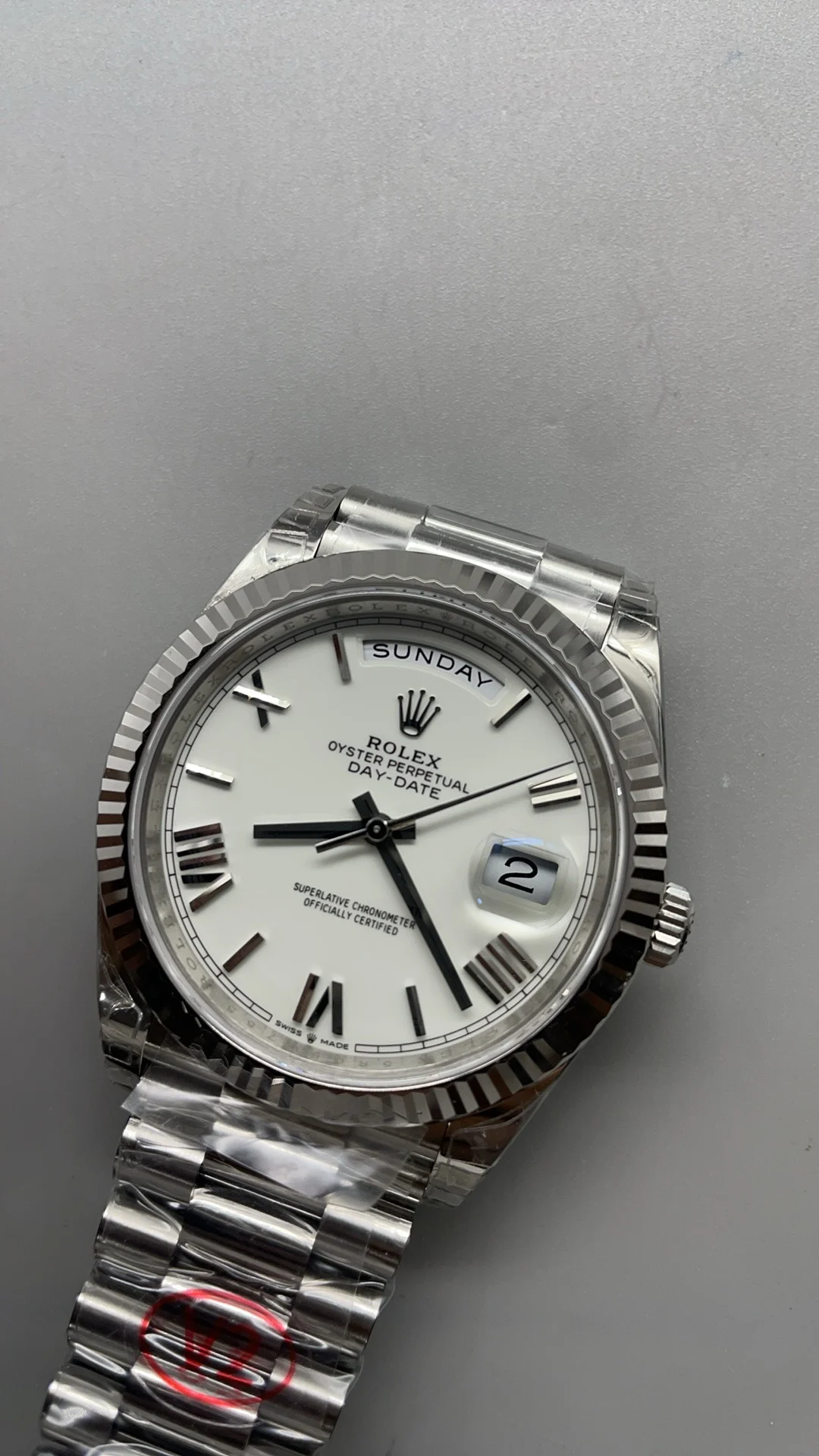 Rolex Day-Date Ceramic White Dial 40mm — photographed off the sweep