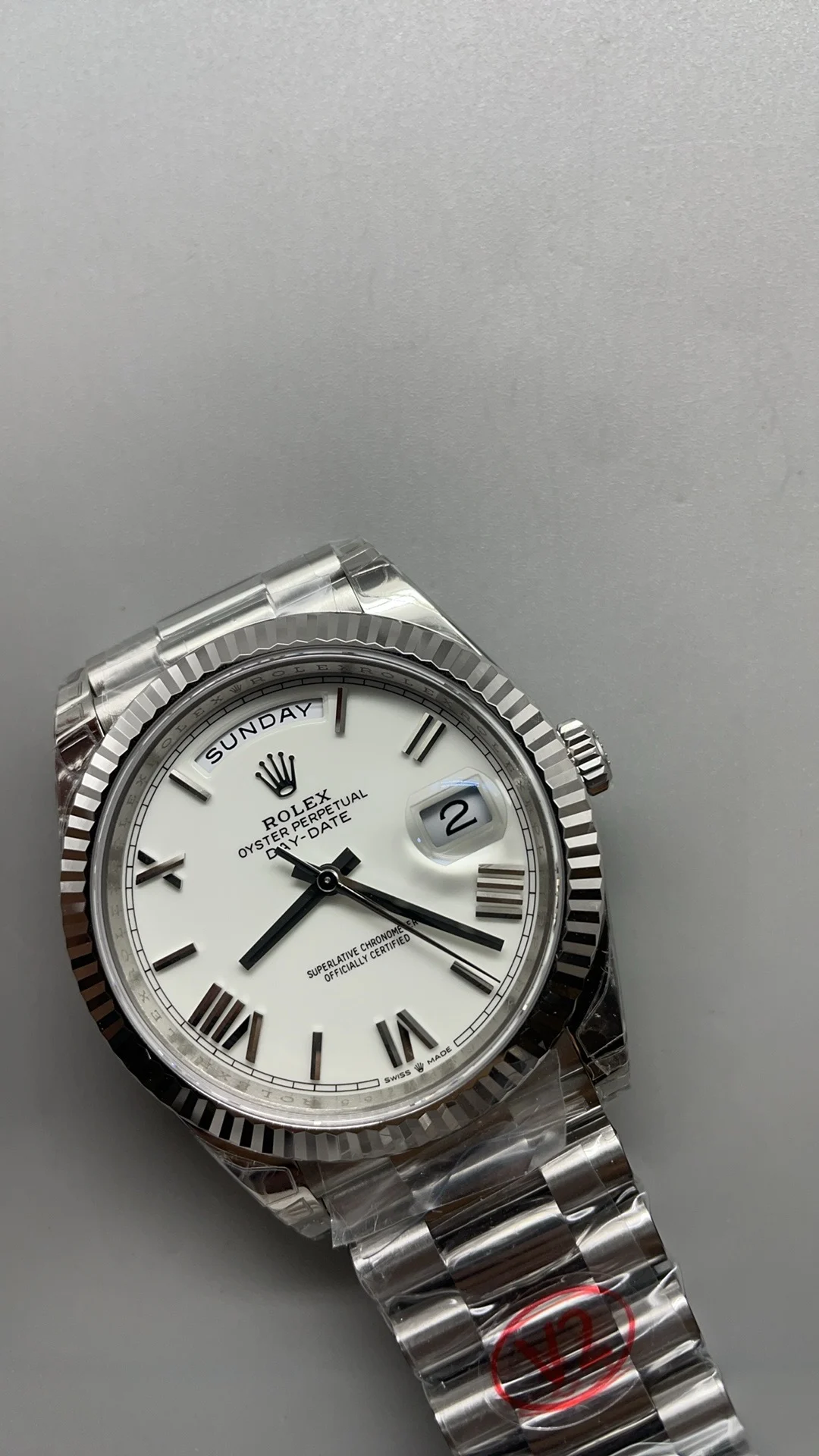 Rolex Day-Date Ceramic White Dial 40mm — photographed off the sweep