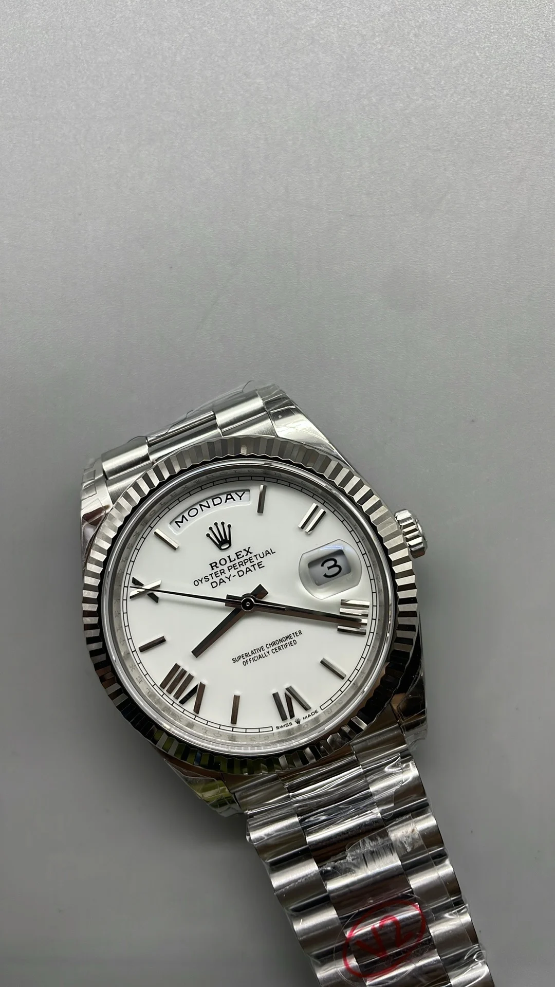 Rolex Day-Date Ceramic White Dial 40mm — photographed off the sweep
