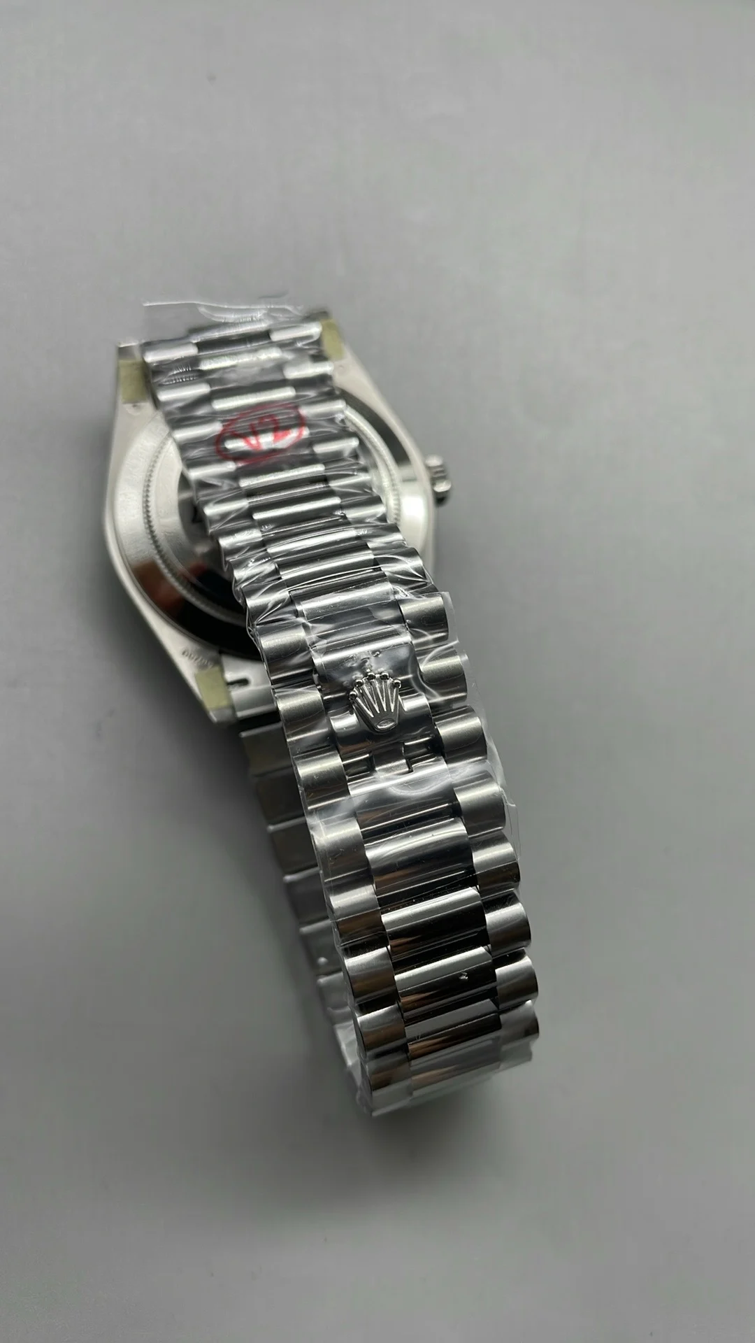 Rolex Day-Date Ceramic White Dial 40mm — photographed off the sweep