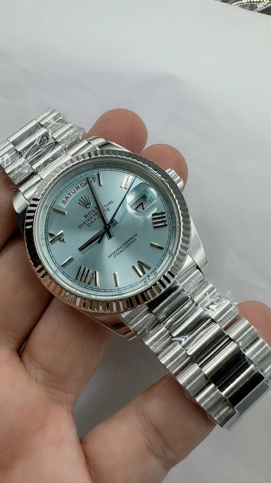 Rolex Day-Date Ice Blue Blue Dial 40mm — photographed off the sweep