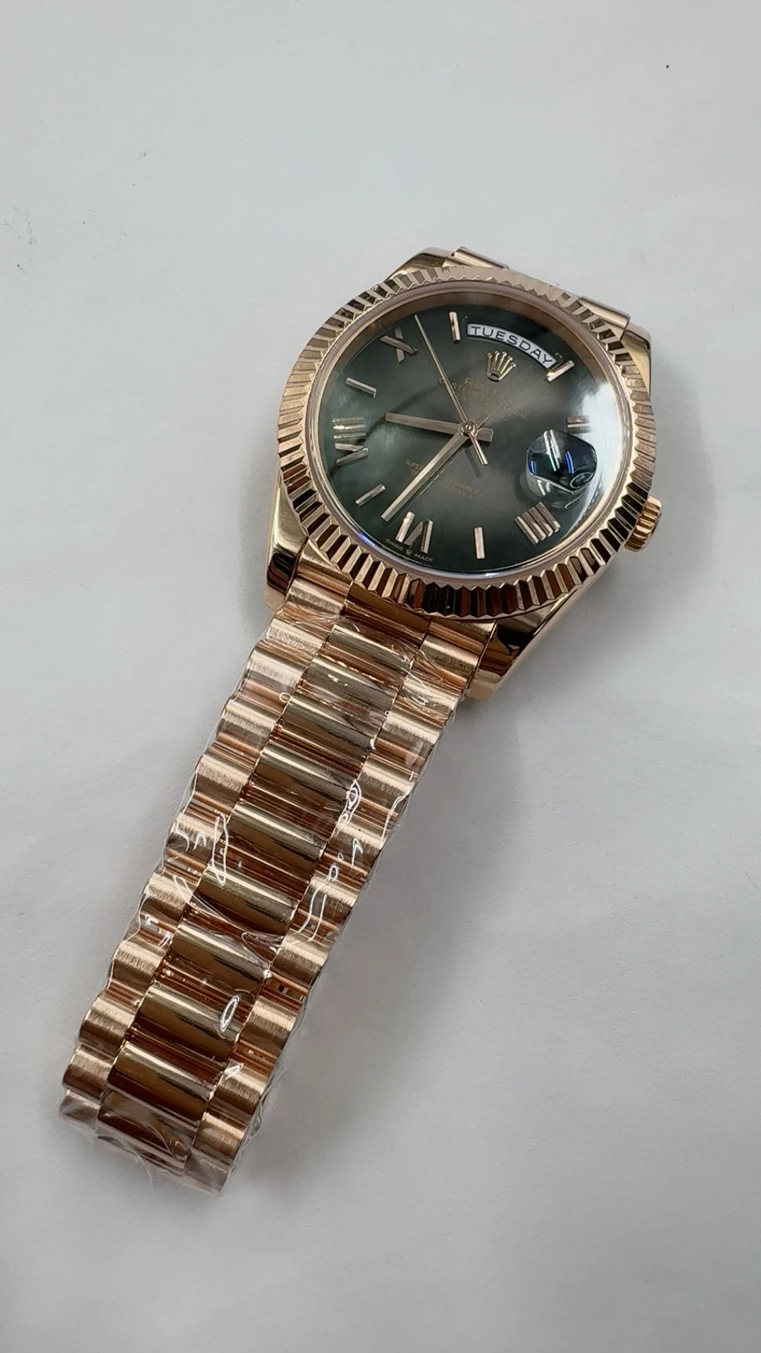 Rolex Day-Date Rose Gold Black Dial 40mm — photographed off the sweep