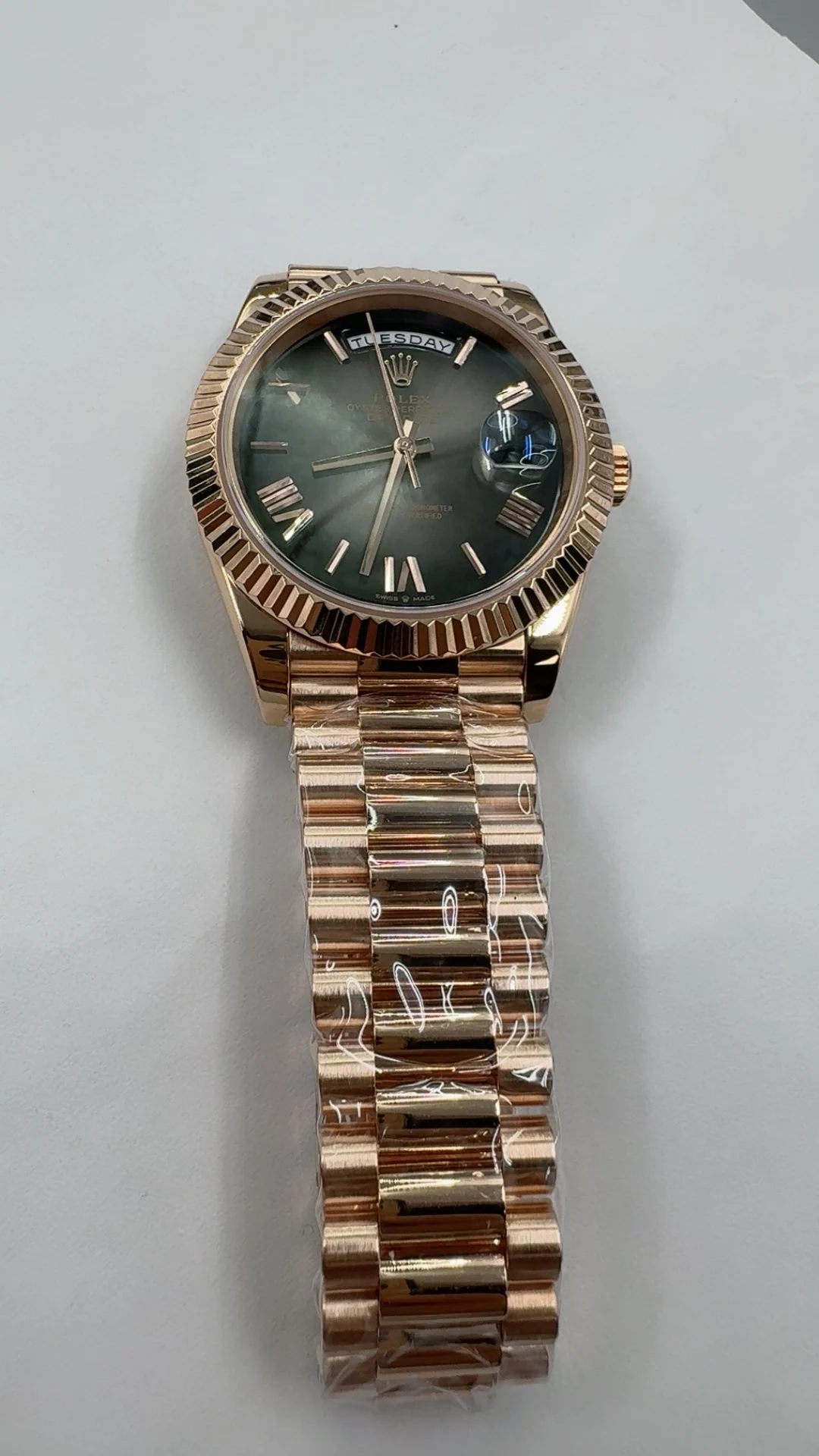 Rolex Day-Date Rose Gold Black Dial 40mm — photographed off the sweep