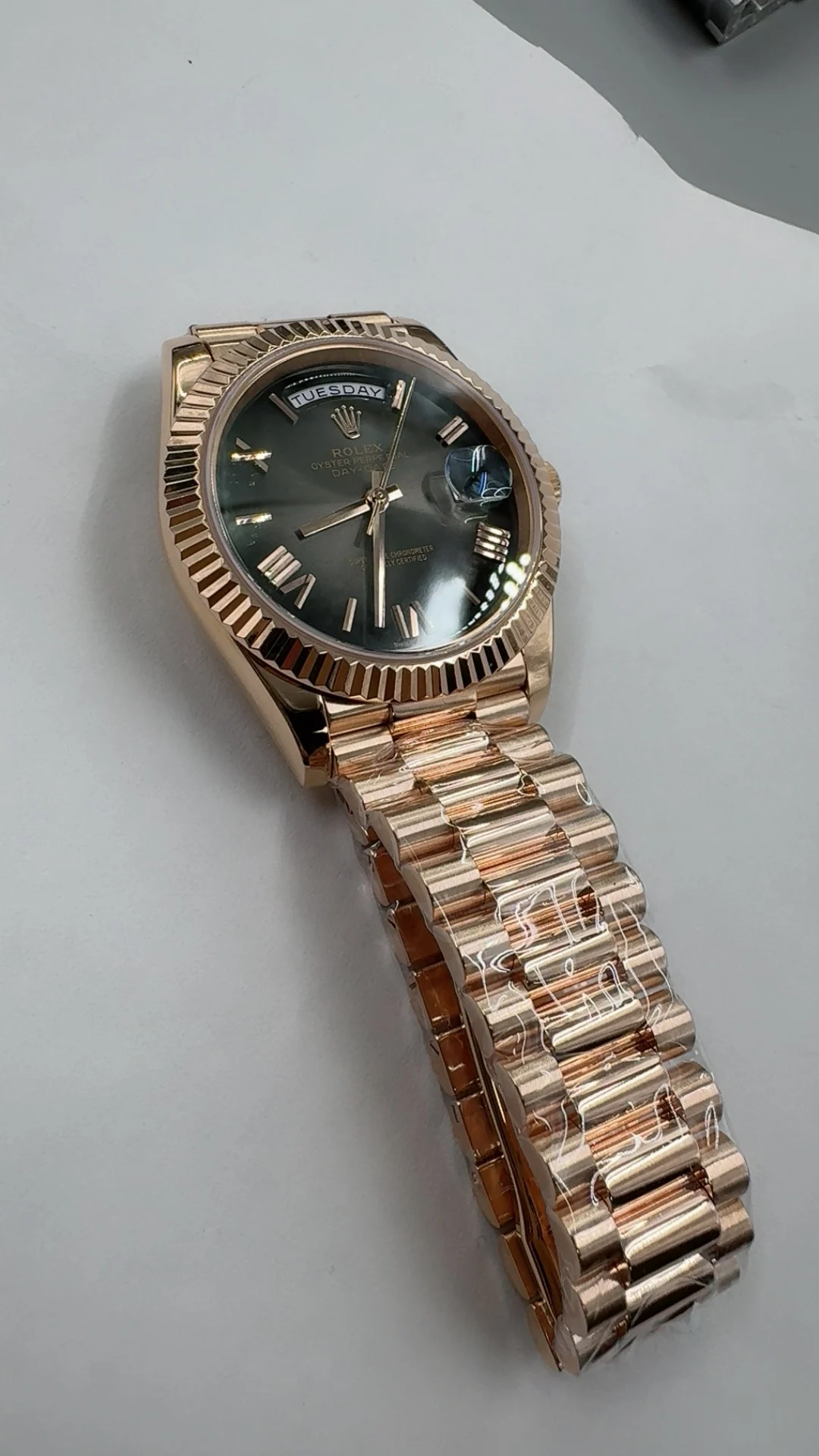 Rolex Day-Date Rose Gold Black Dial 40mm — photographed off the sweep