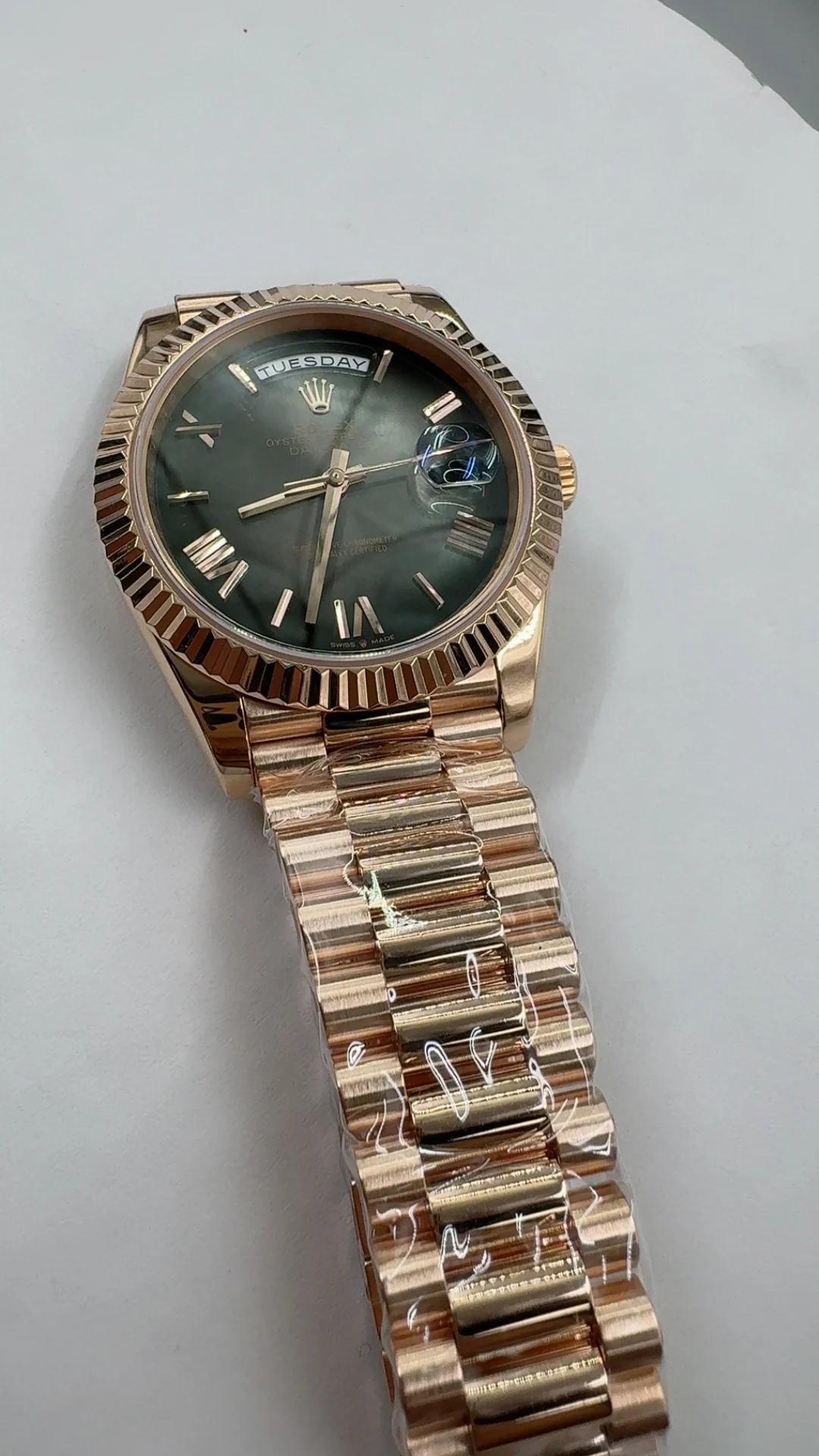 Rolex Day-Date Rose Gold Black Dial 40mm — photographed off the sweep