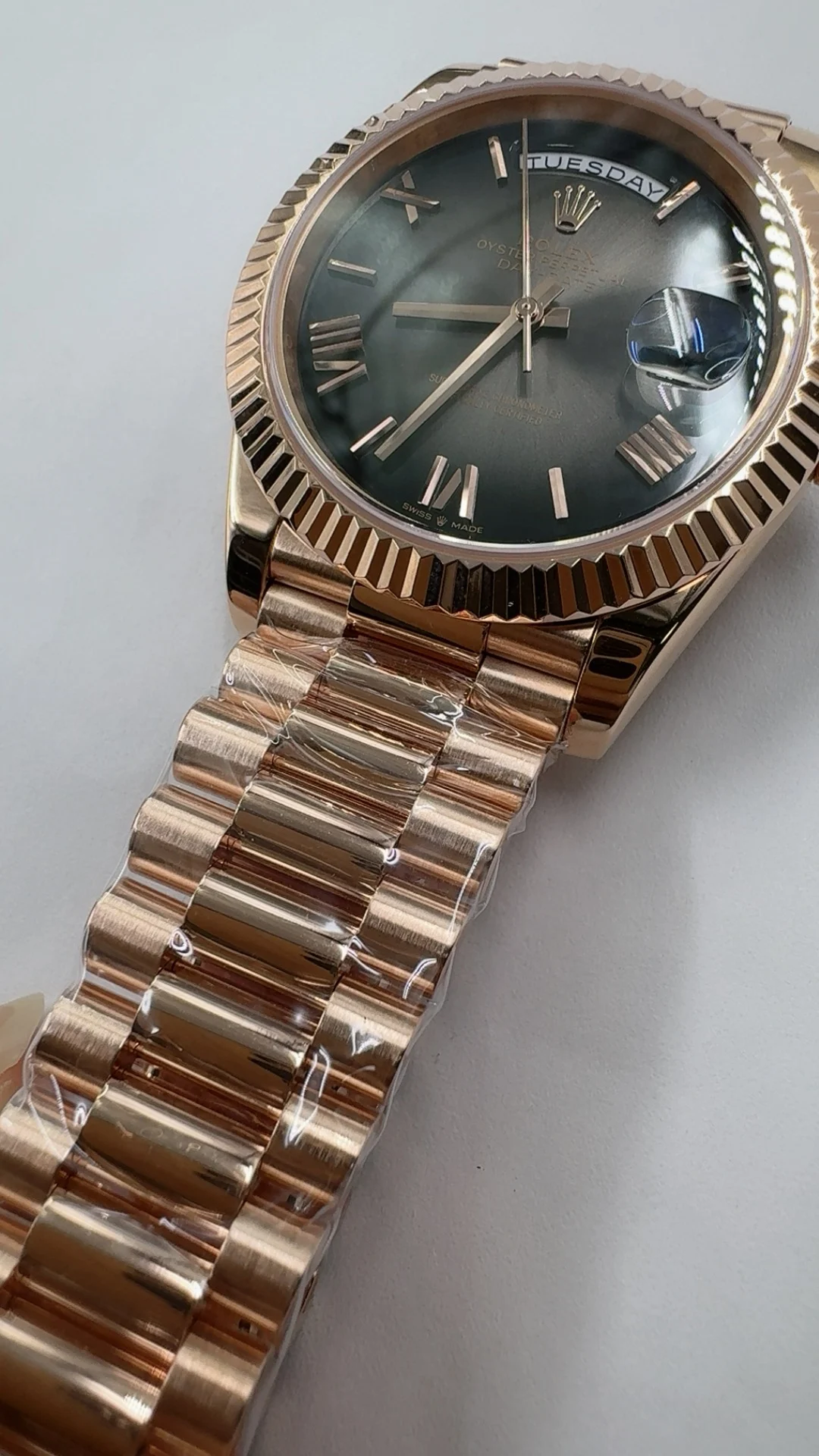 Rolex Day-Date Rose Gold Black Dial 40mm — photographed off the sweep