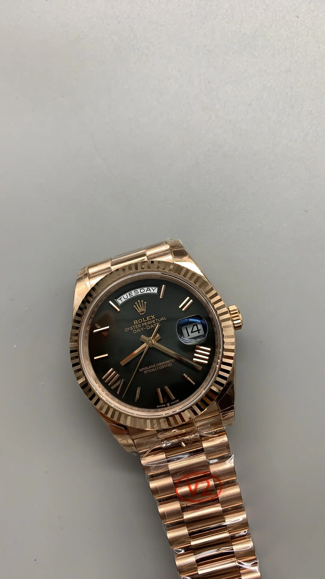 Rolex Day-Date Rose Gold Black Dial 40mm — photographed off the sweep