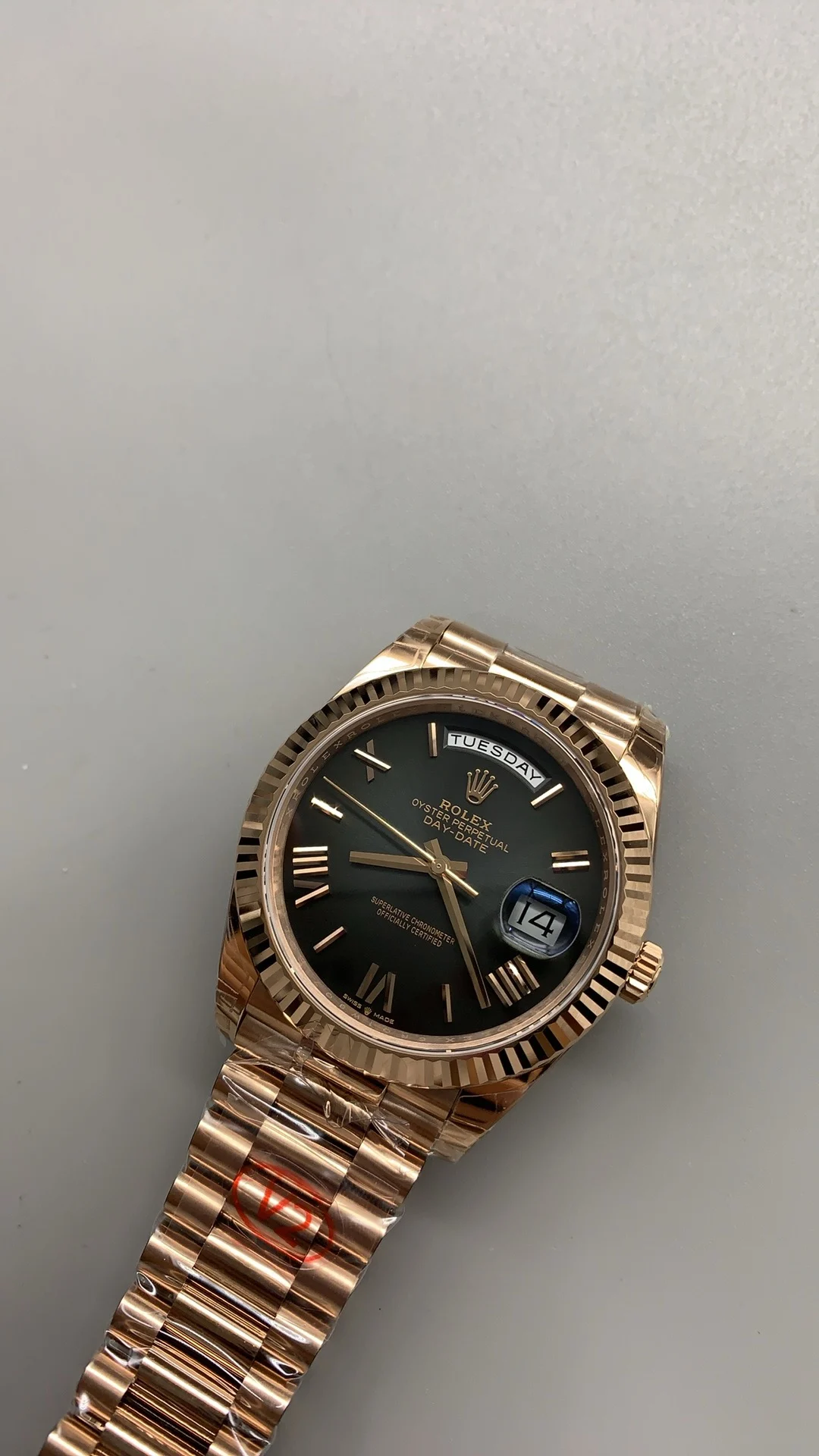 Rolex Day-Date Rose Gold Black Dial 40mm — photographed off the sweep