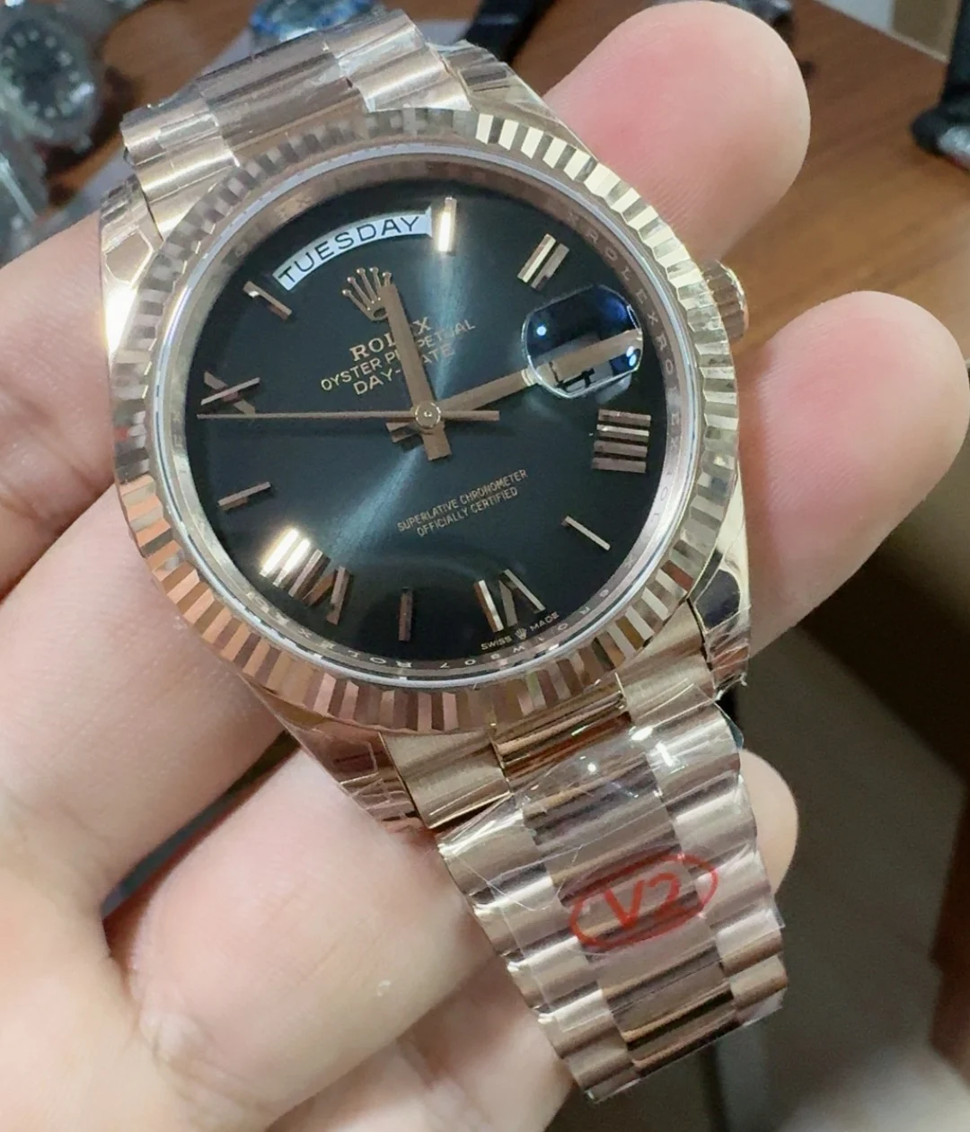 Rolex Day-Date Rose Gold Black Dial 40mm — photographed off the sweep