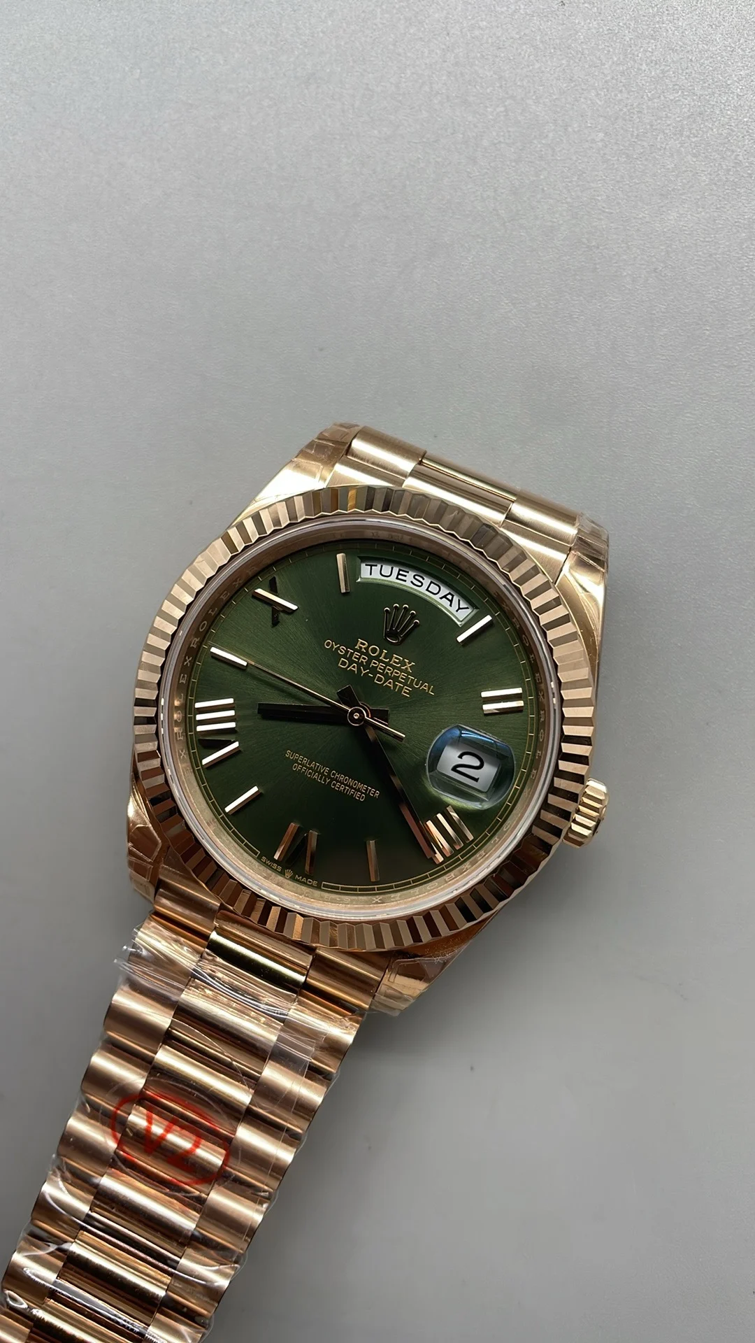 Rolex Day-Date Rose Gold Green Dial 40mm — photographed off the sweep