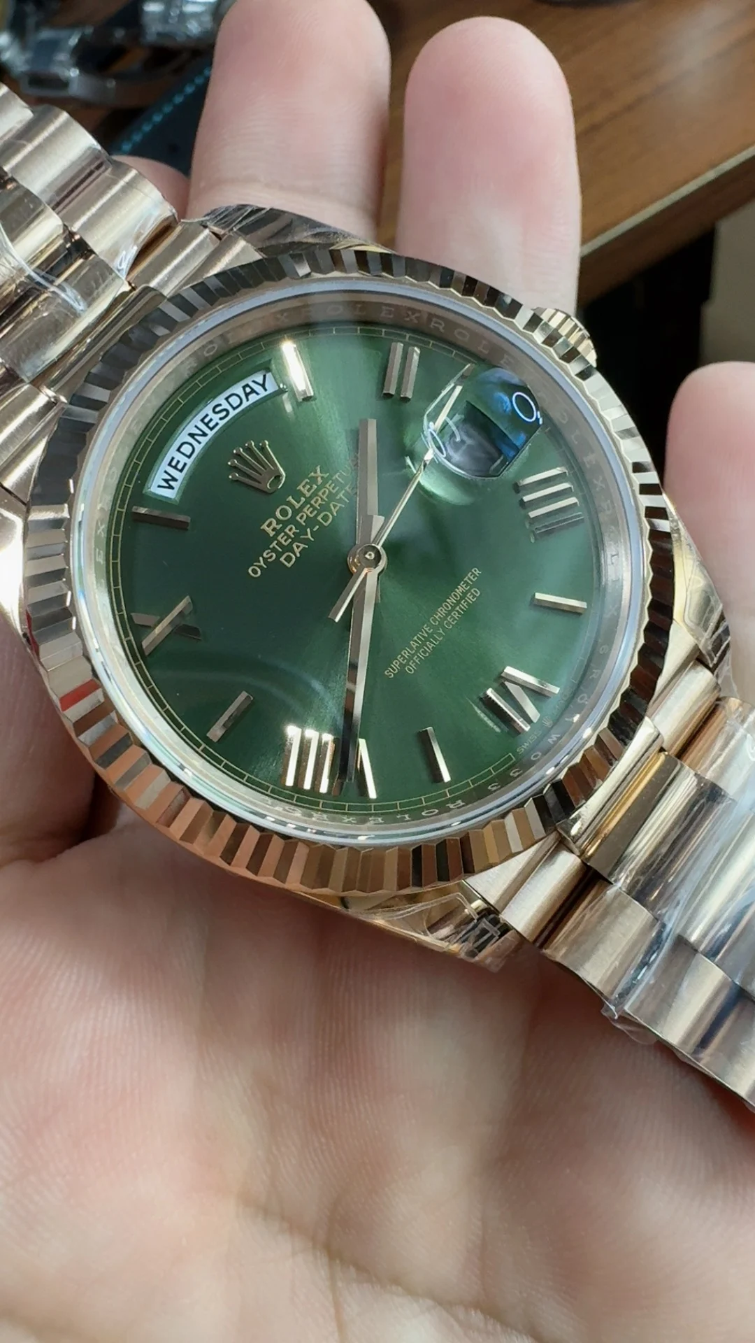 Rolex Day-Date Rose Gold Green Dial 40mm — photographed off the sweep