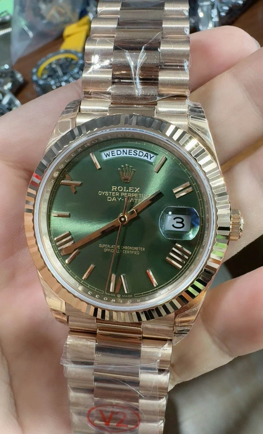 Rolex Day-Date Rose Gold Green Dial 40mm — photographed off the sweep