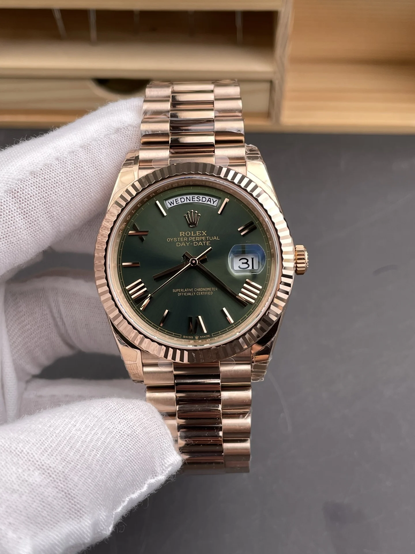 Rolex Day-Date Rose Gold Green Dial 40mm — photographed off the sweep
