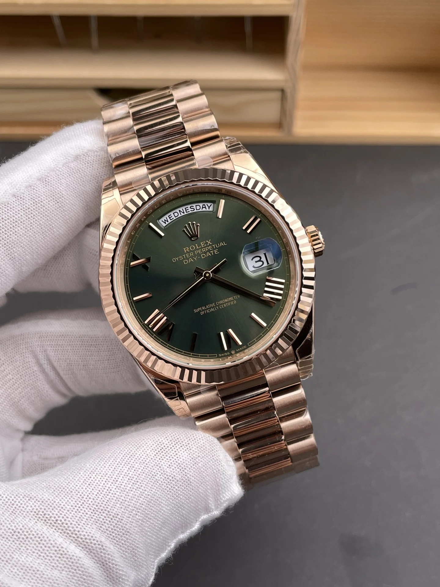 Rolex Day-Date Rose Gold Green Dial 40mm — photographed off the sweep