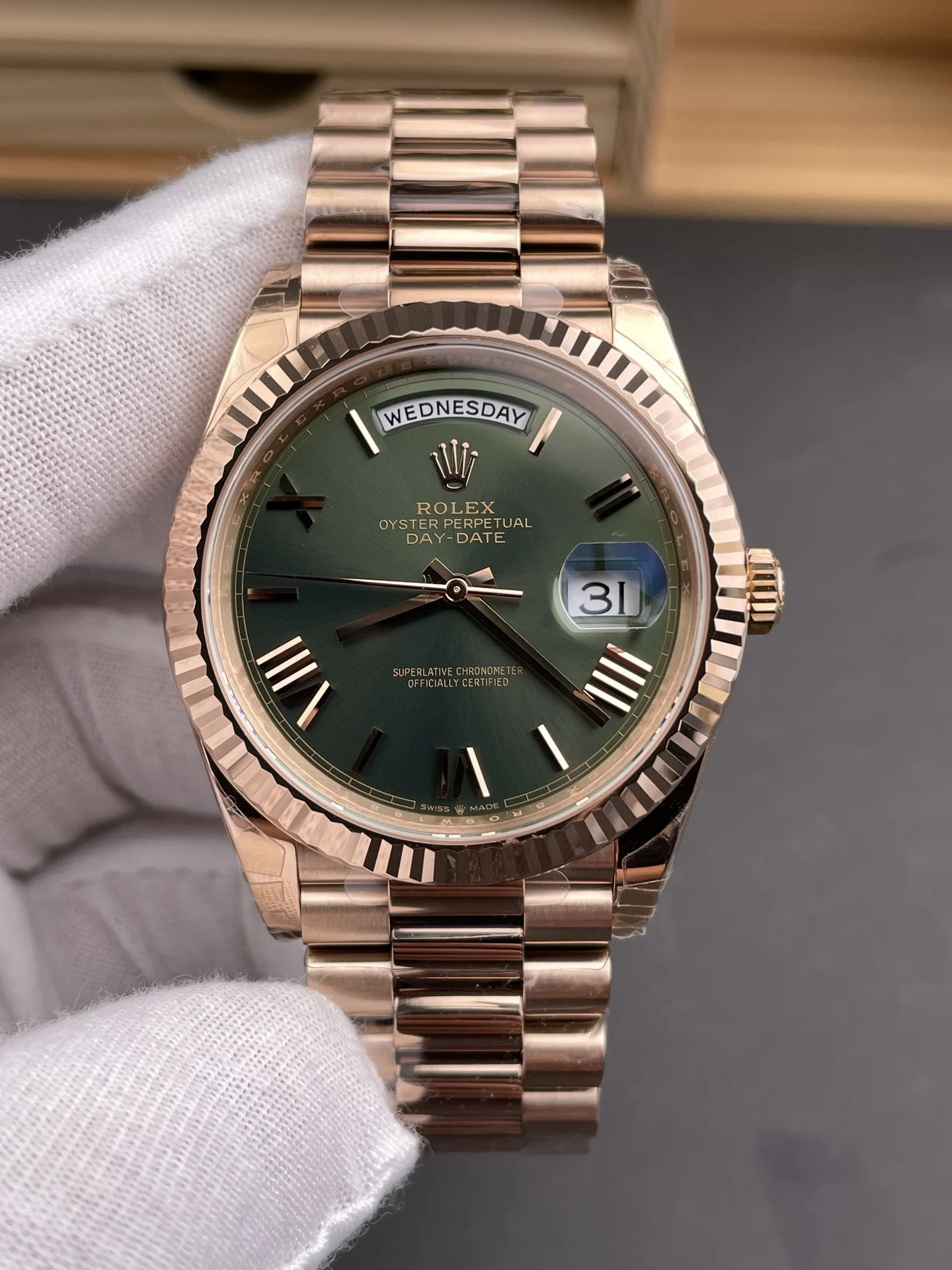 Rolex Day-Date Rose Gold Green Dial 40mm — photographed off the sweep