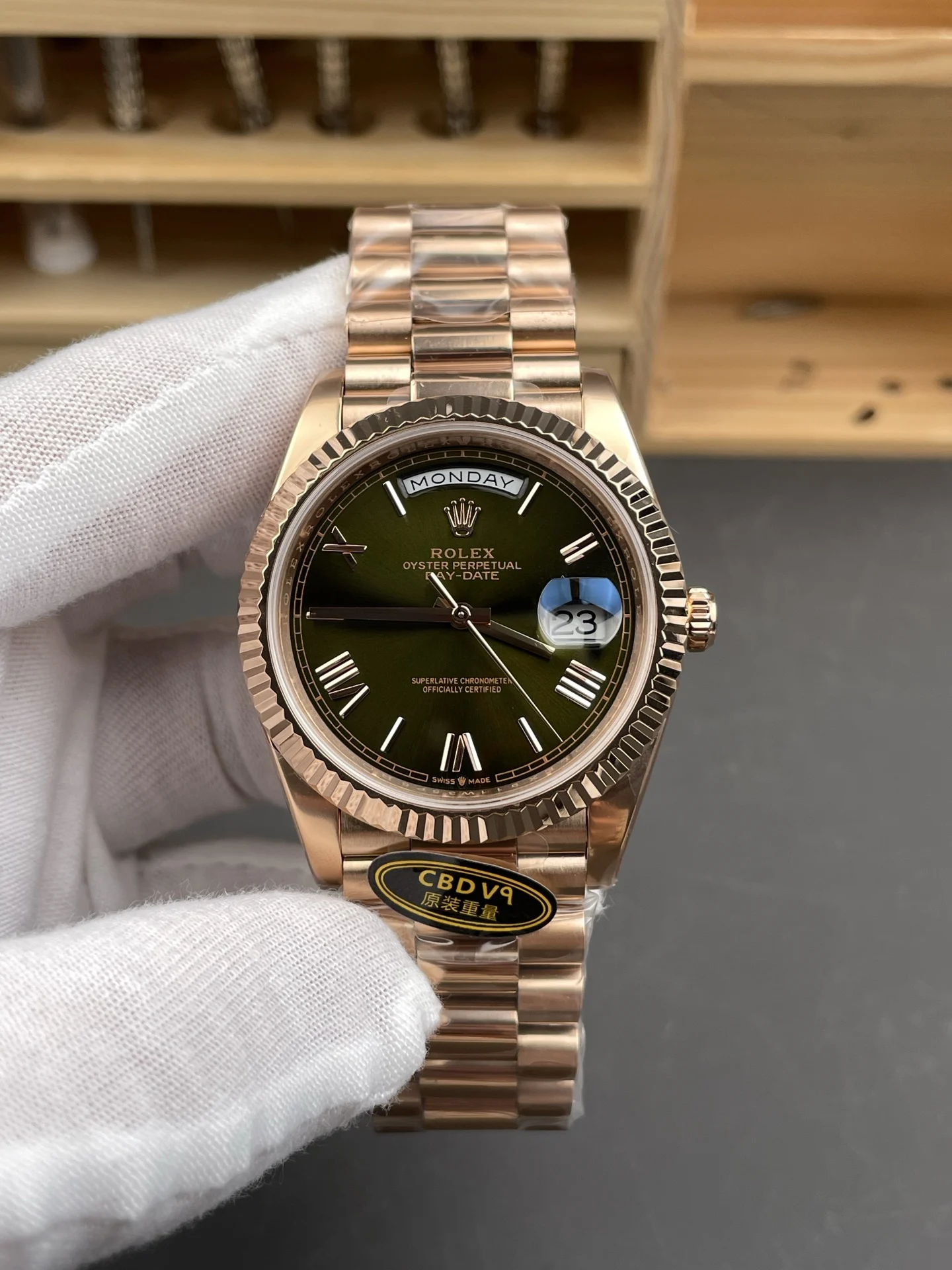 Rolex Day-Date Rose Gold Green Dial 40mm — photographed off the sweep