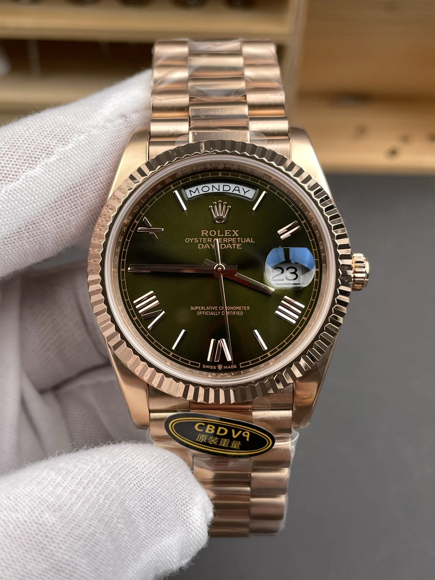 Rolex Day-Date Rose Gold Green Dial 40mm — photographed off the sweep