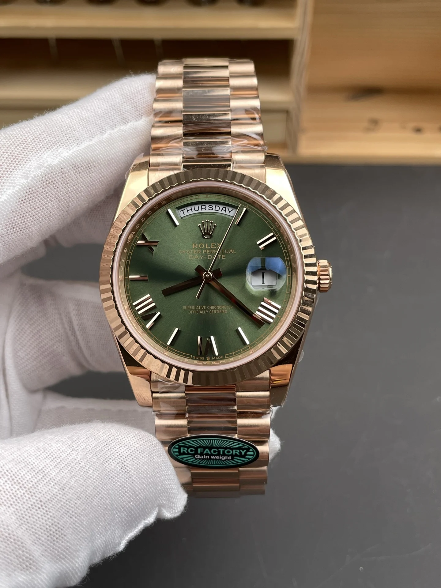 Rolex Day-Date Rose Gold Green Dial 40mm — photographed off the sweep