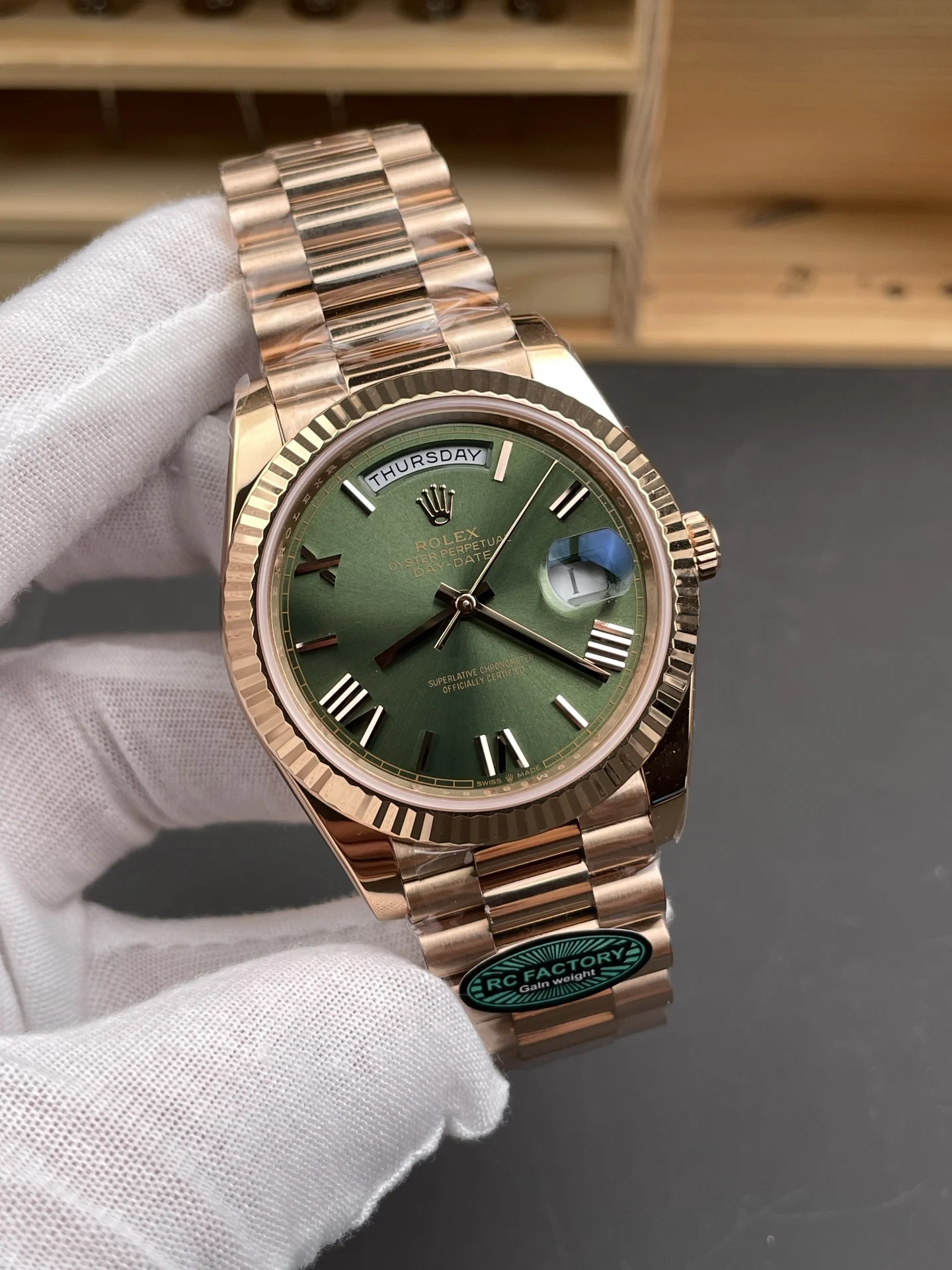 Rolex Day-Date Rose Gold Green Dial 40mm — photographed off the sweep