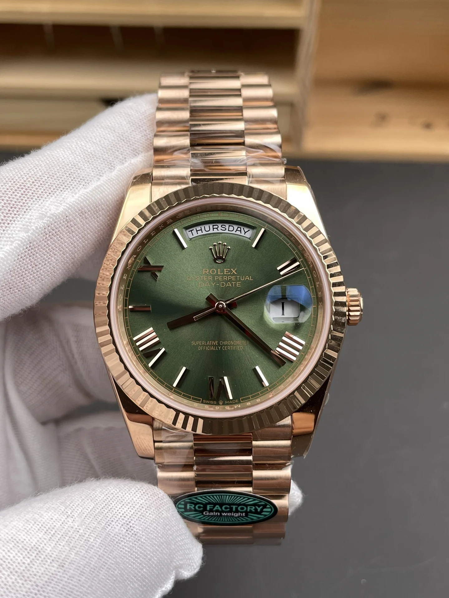 Rolex Day-Date Rose Gold Green Dial 40mm — photographed off the sweep