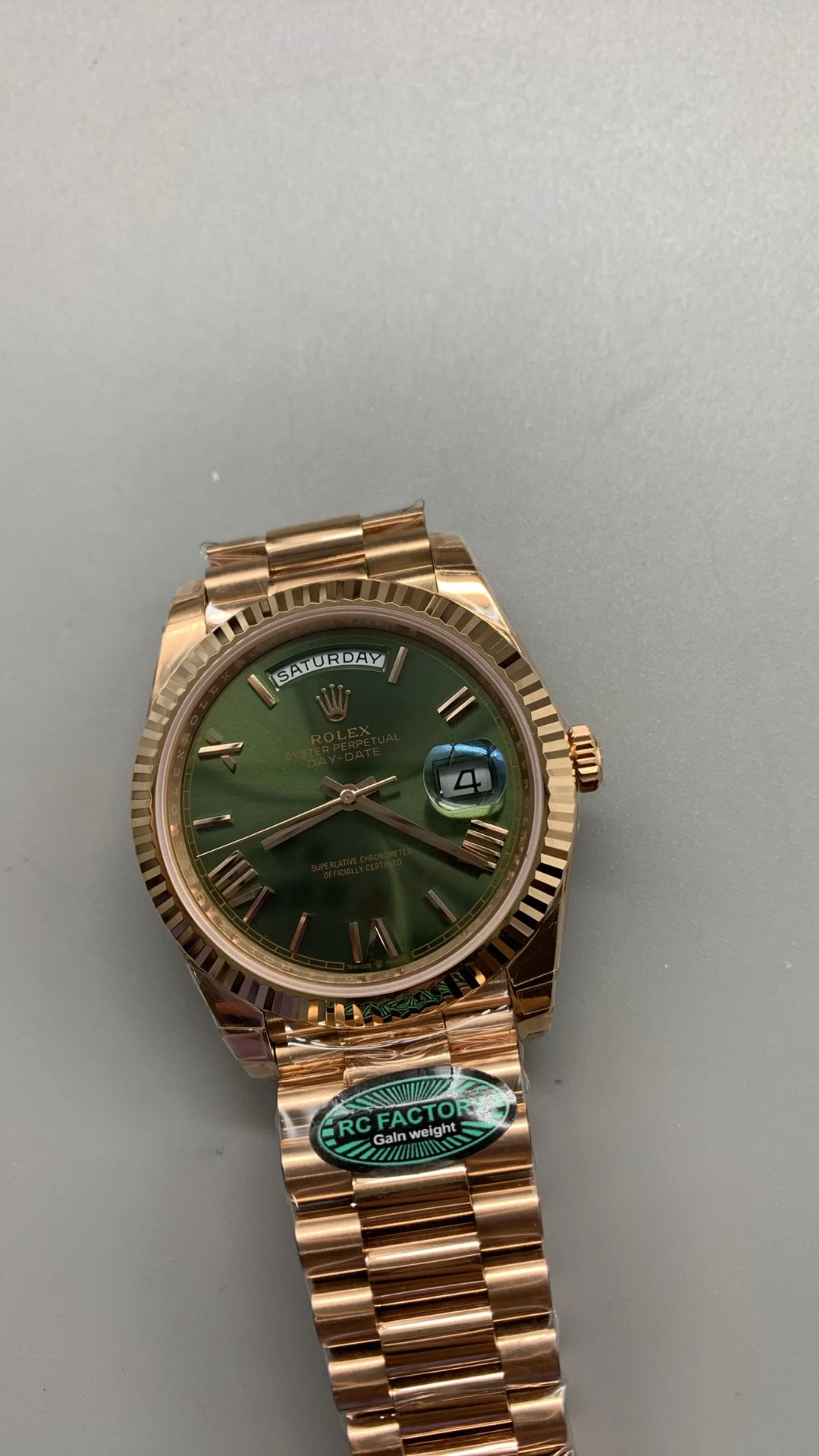 Rolex Day-Date Rose Gold Green Dial 40mm — photographed off the sweep