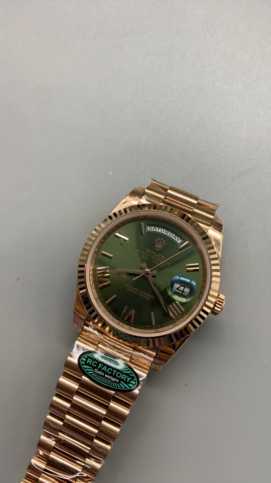 Rolex Day-Date Rose Gold Green Dial 40mm — photographed off the sweep