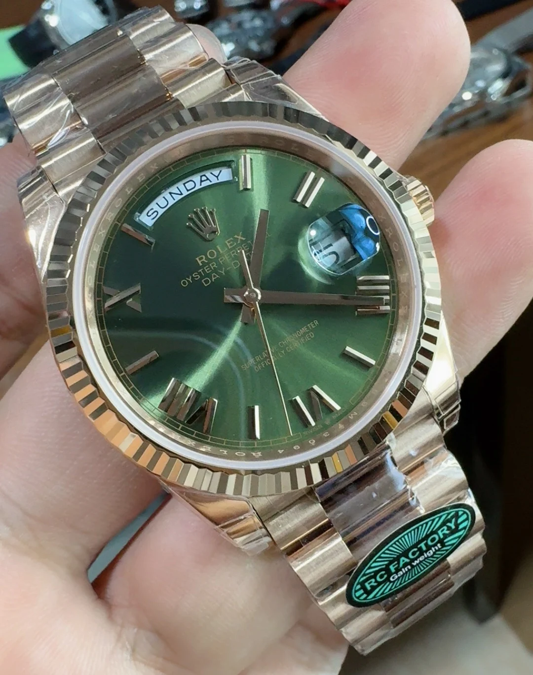 Rolex Day-Date Rose Gold Green Dial 40mm — photographed off the sweep