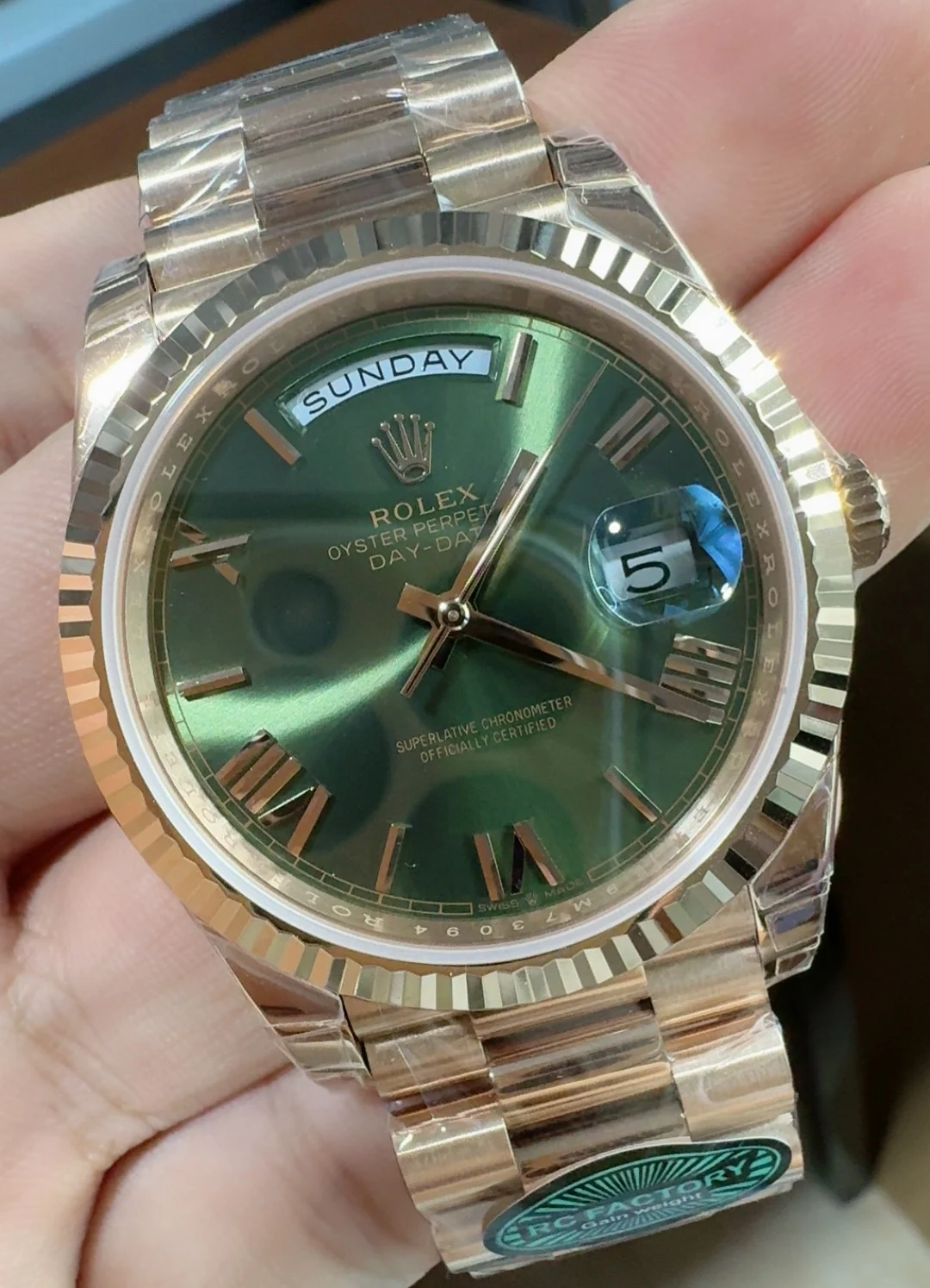 Rolex Day-Date Rose Gold Green Dial 40mm — photographed off the sweep