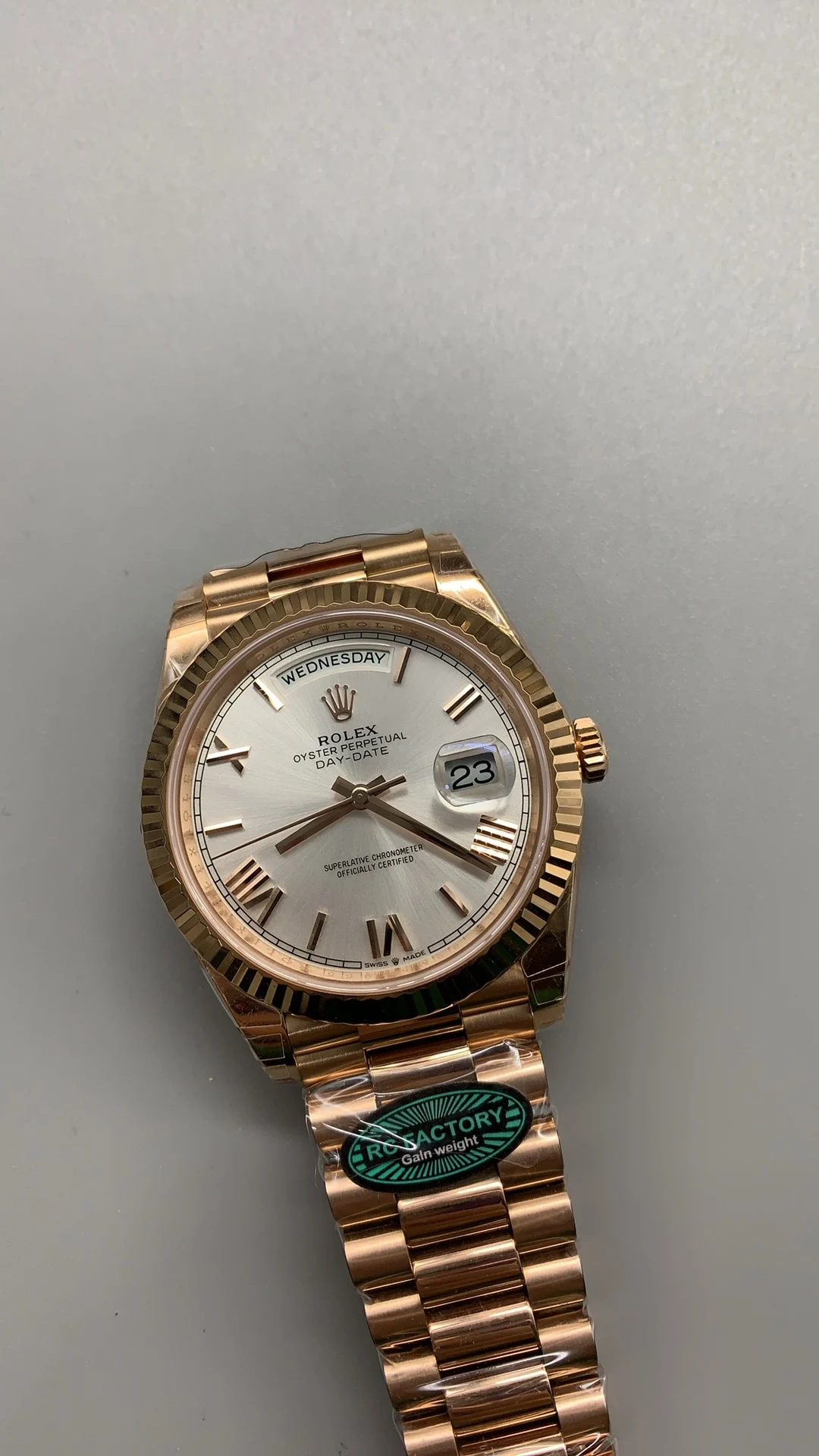 Rolex Day-Date Rose Gold Silver Dial — photographed off the sweep