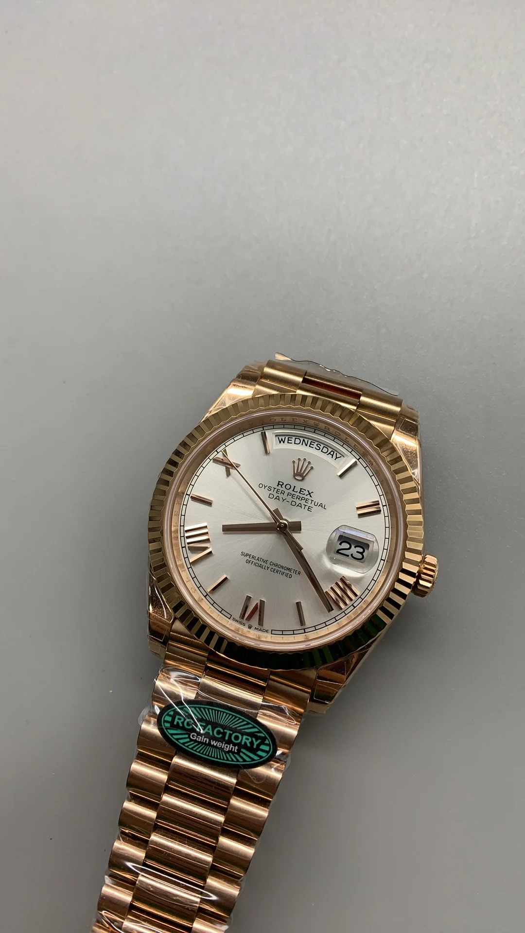Rolex Day-Date Rose Gold Silver Dial — photographed off the sweep