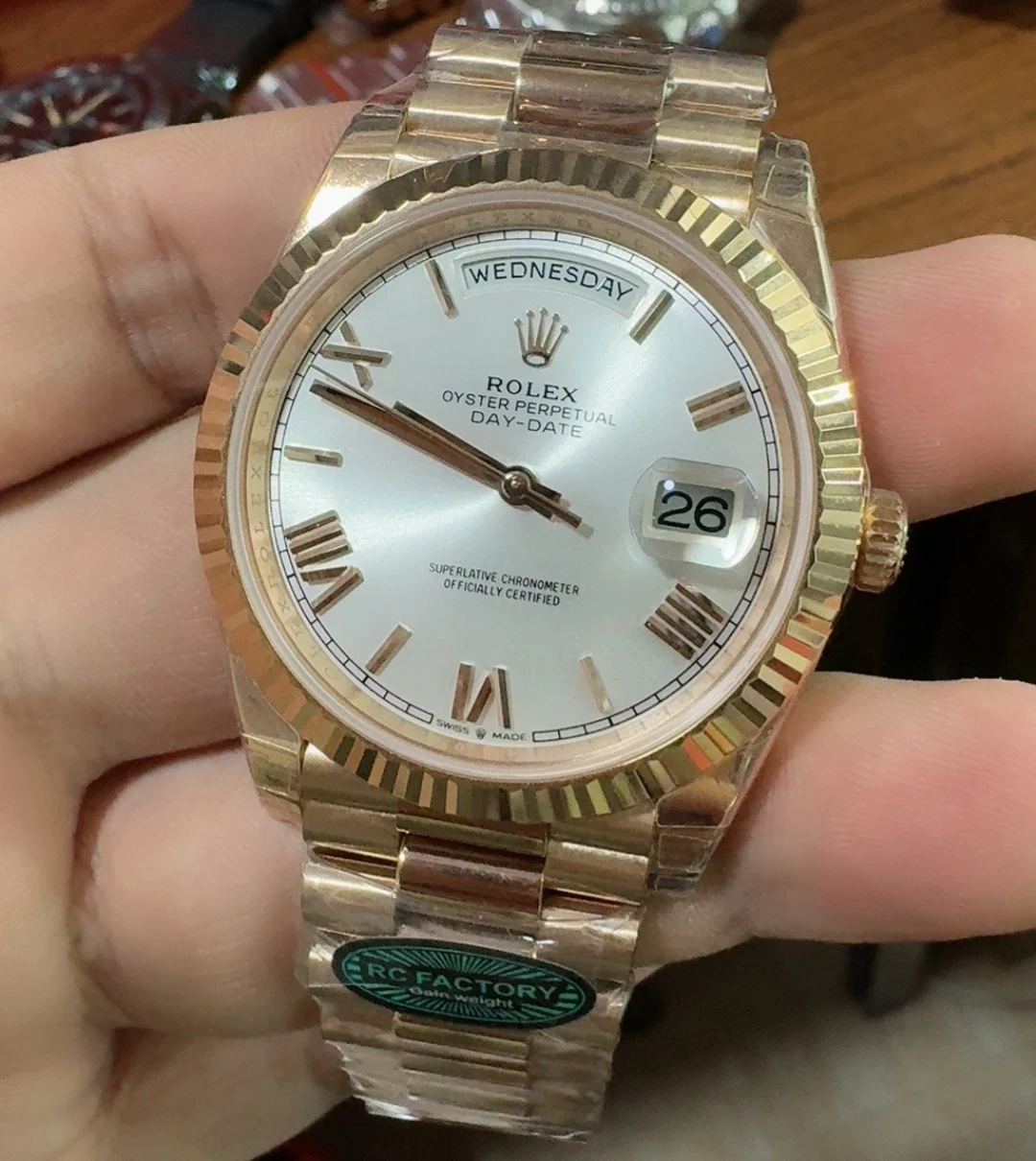 Rolex Day-Date Rose Gold Silver Dial — photographed off the sweep
