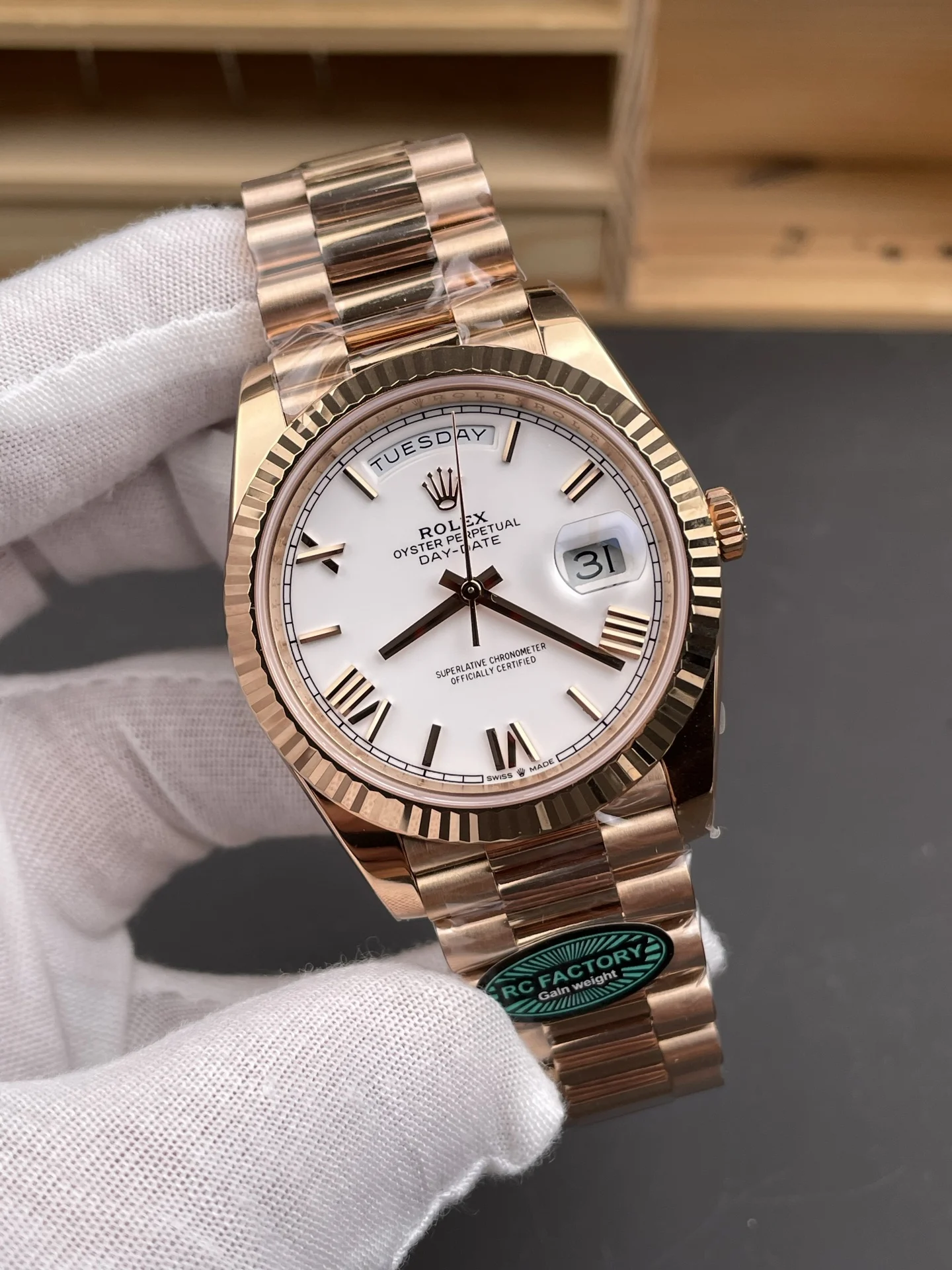 Rolex Day-Date Rose Gold White Dial 40mm — photographed off the sweep