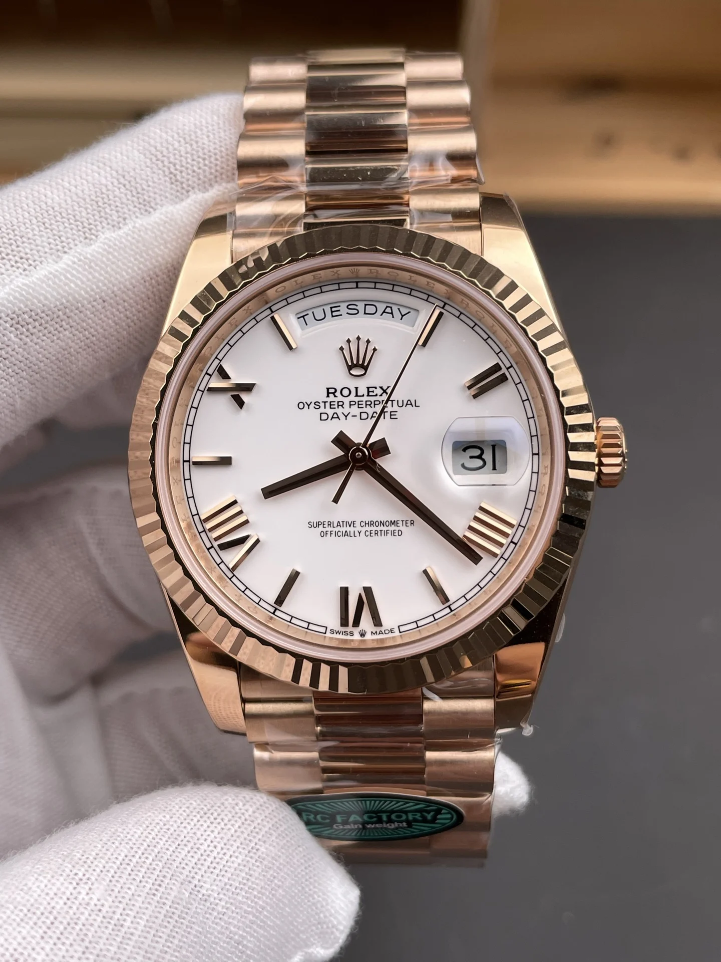 Rolex Day-Date Rose Gold White Dial 40mm — photographed off the sweep