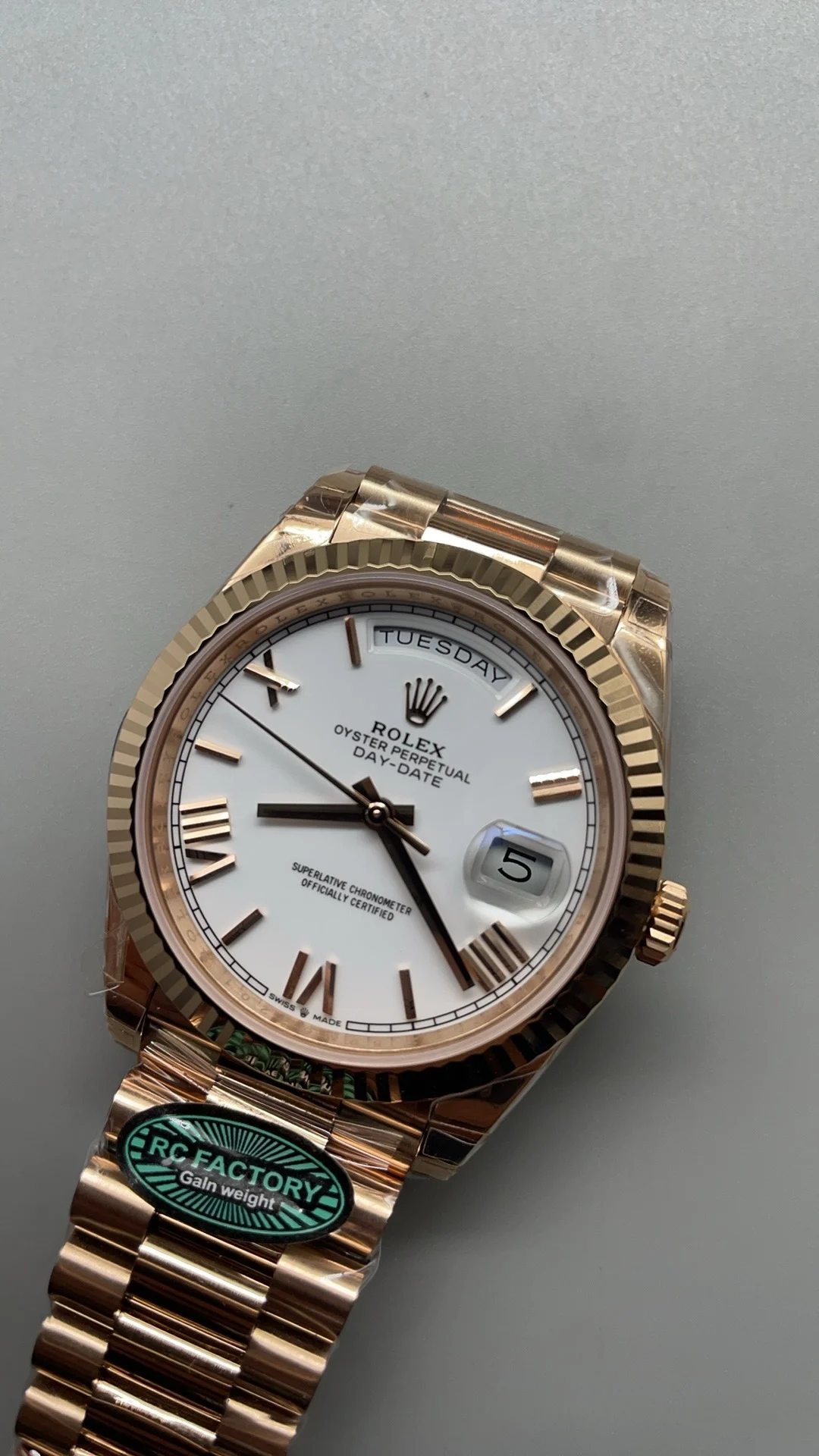 Rolex Day-Date Rose Gold White Dial 40mm — photographed off the sweep