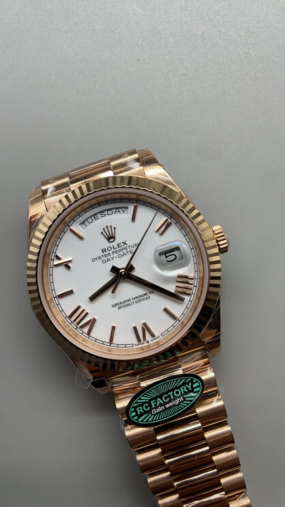 Rolex Day-Date Rose Gold White Dial 40mm — photographed off the sweep