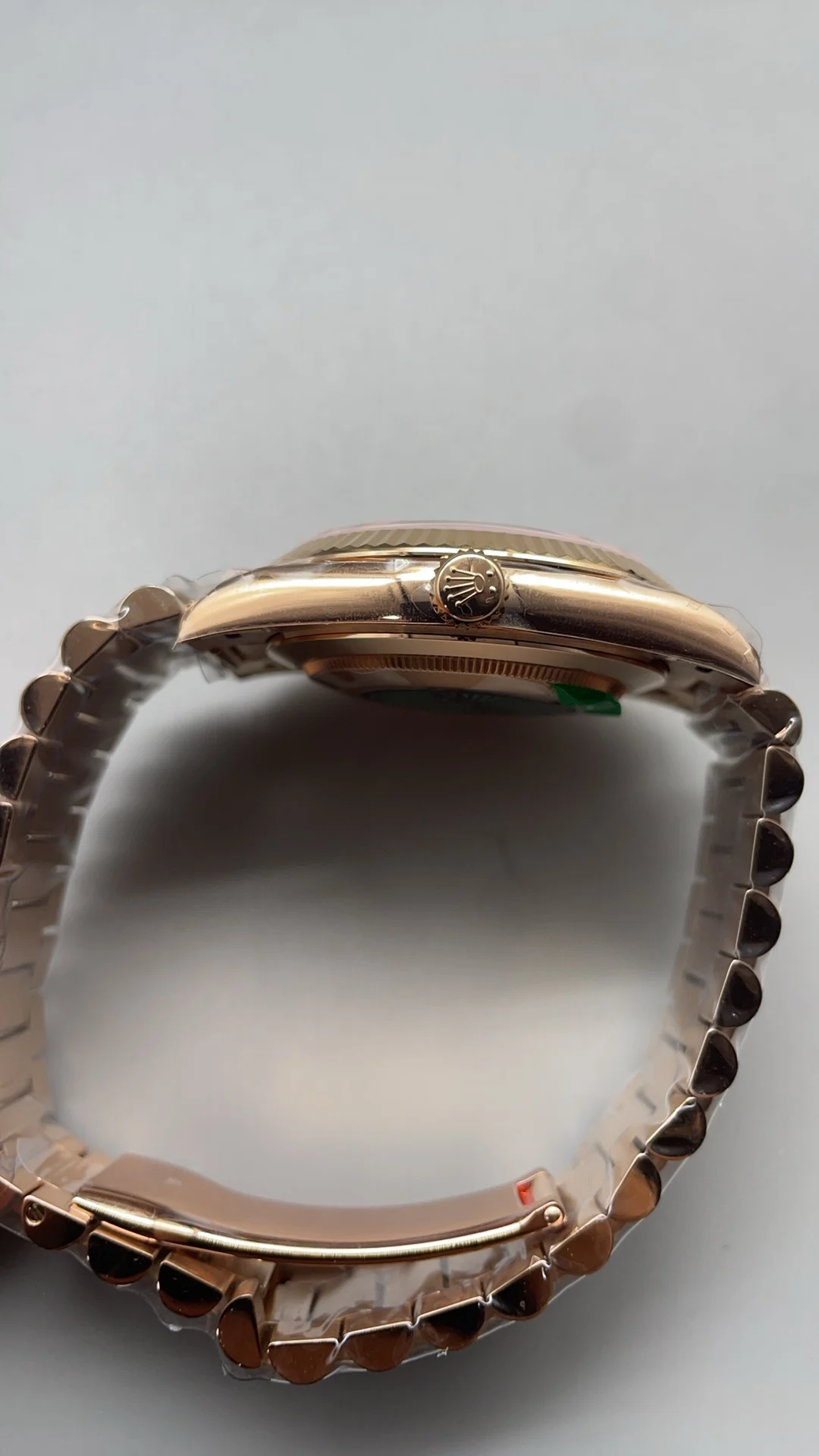 Rolex Day-Date Rose Gold White Dial 40mm — photographed off the sweep