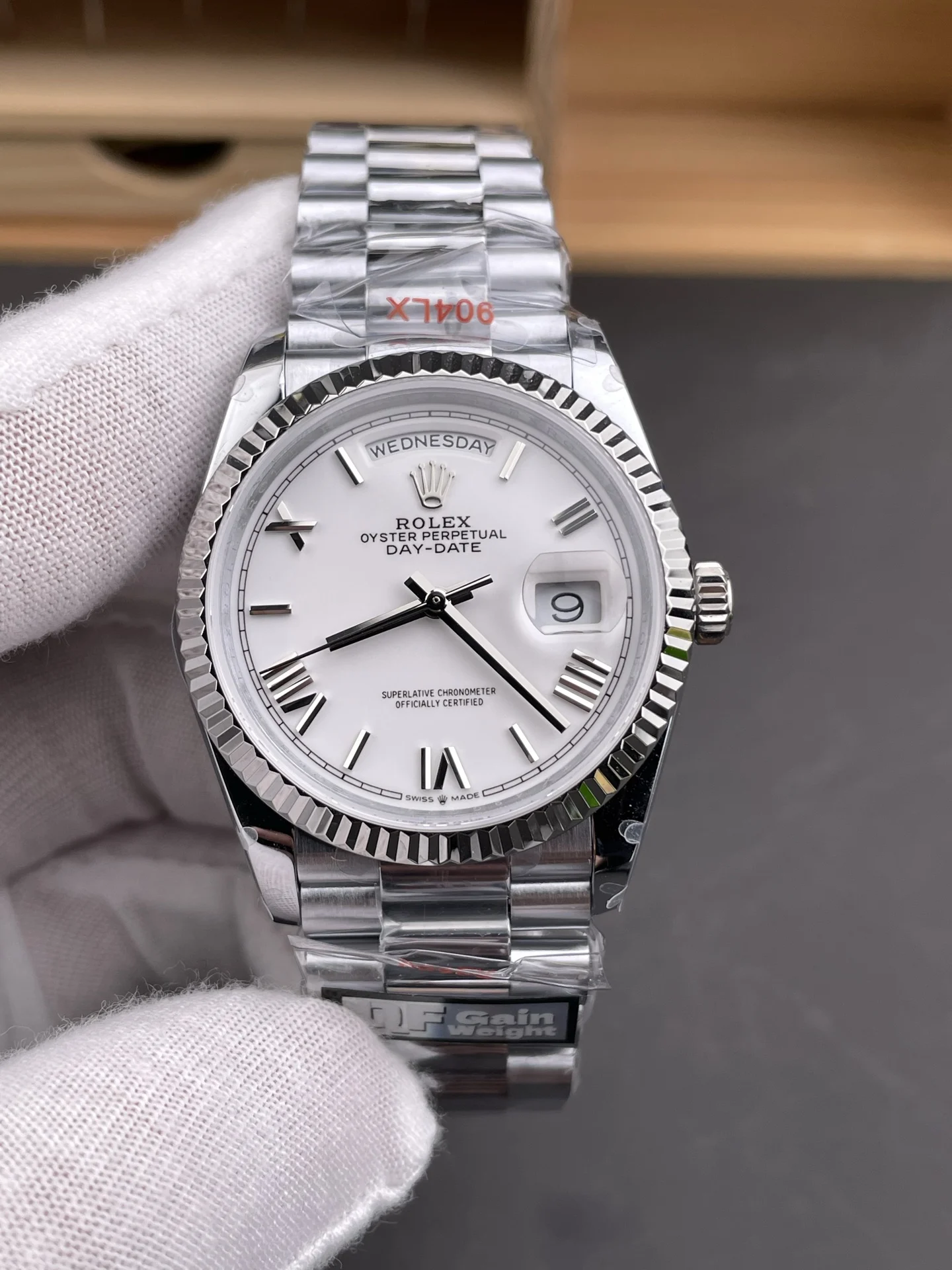 Rolex Day-Date White Dial 36mm — photographed off the sweep