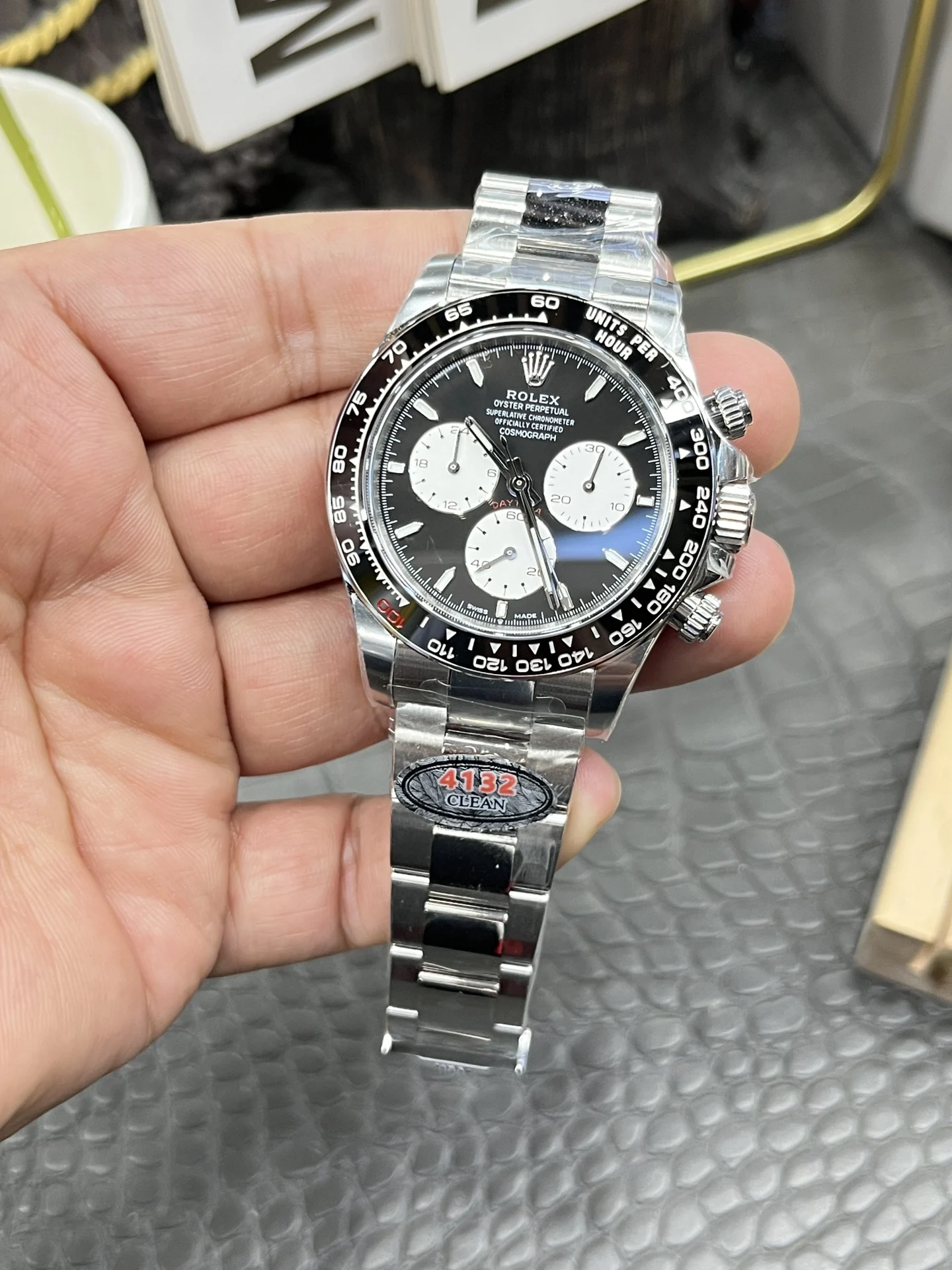 Rolex Daytona 40mm — photographed off the sweep