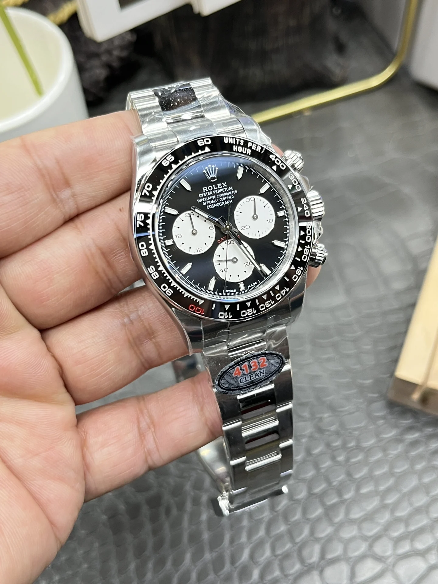 Rolex Daytona 40mm — photographed off the sweep