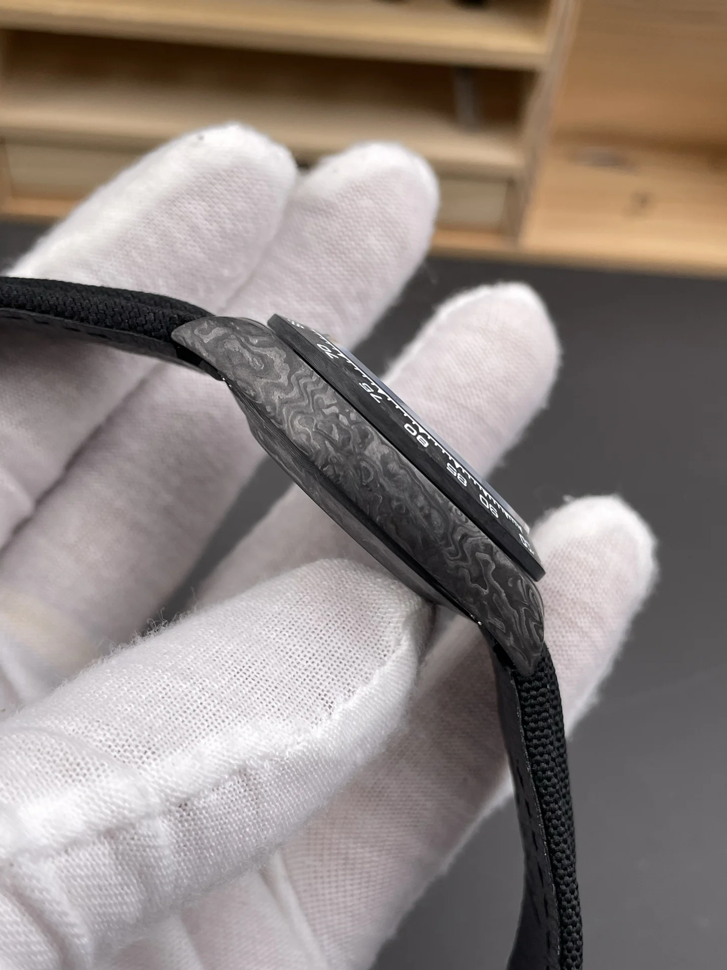 Rolex Daytona Carbon 40mm — photographed off the sweep