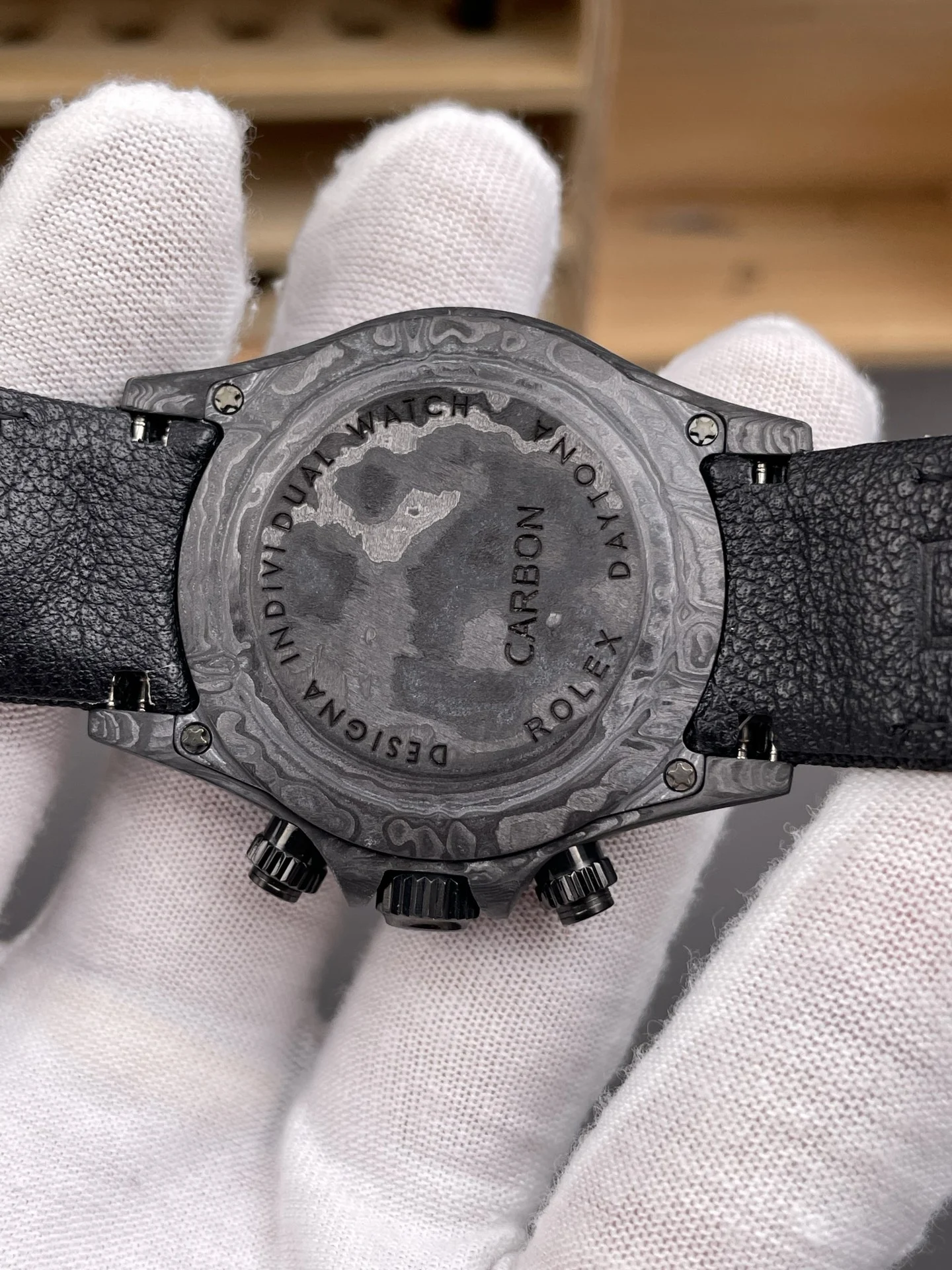 Rolex Daytona Carbon 40mm — photographed off the sweep