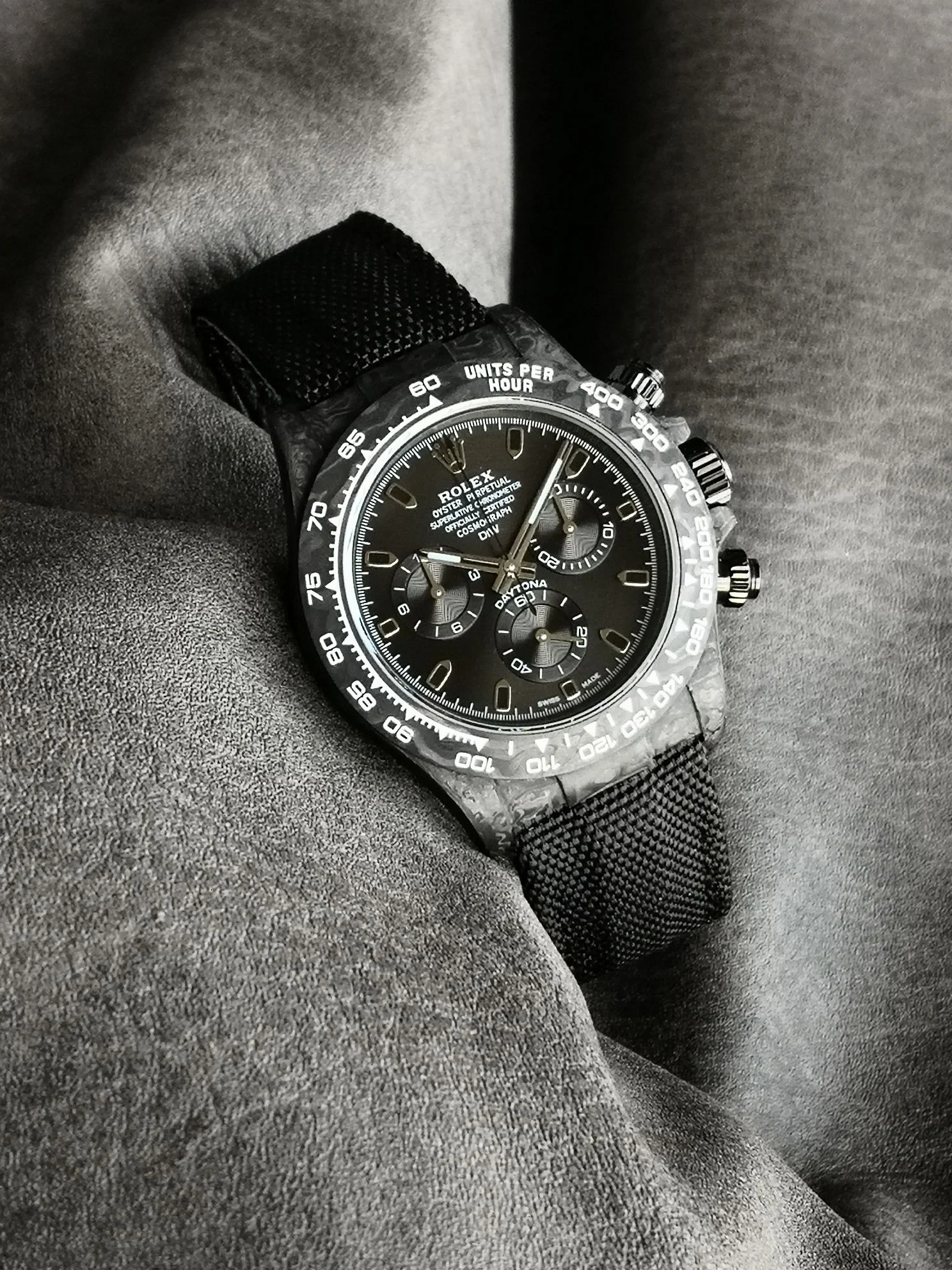 Rolex Daytona Carbon — photographed off the sweep